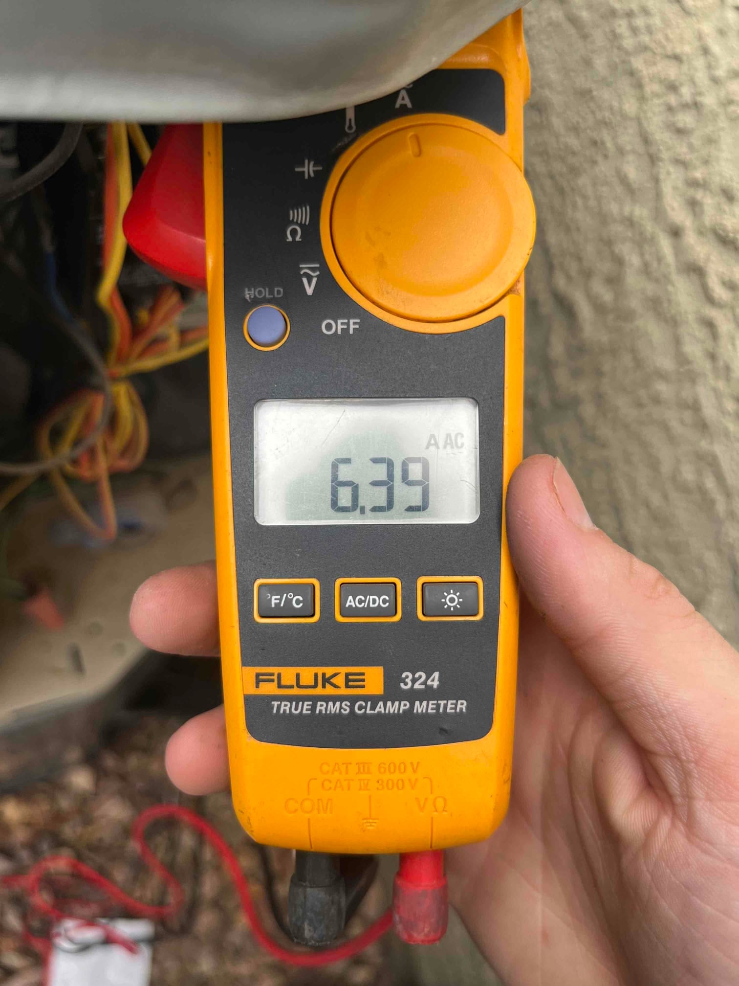 HVAC diagnostic instrument photographed during the service visit.