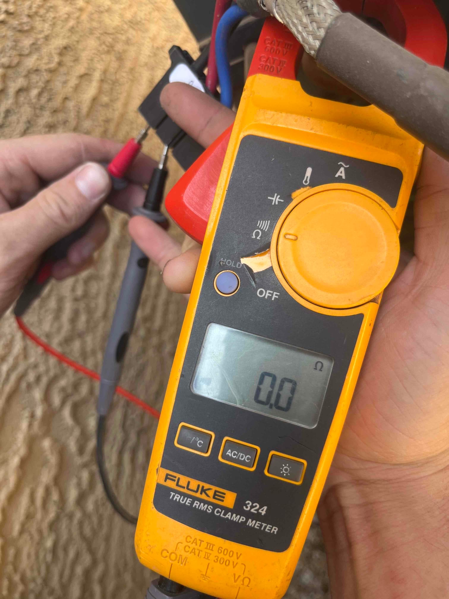 HVAC diagnostic instrument photographed during the service visit.
