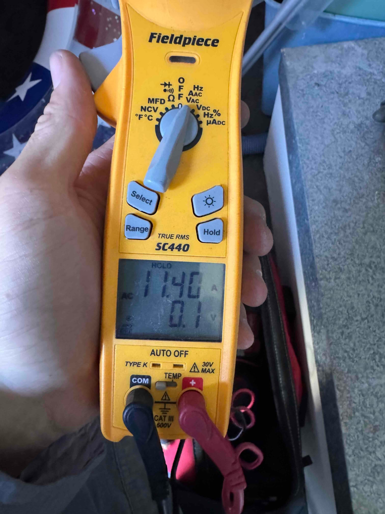 Diagnostic instrument display shows 11.4 A.
