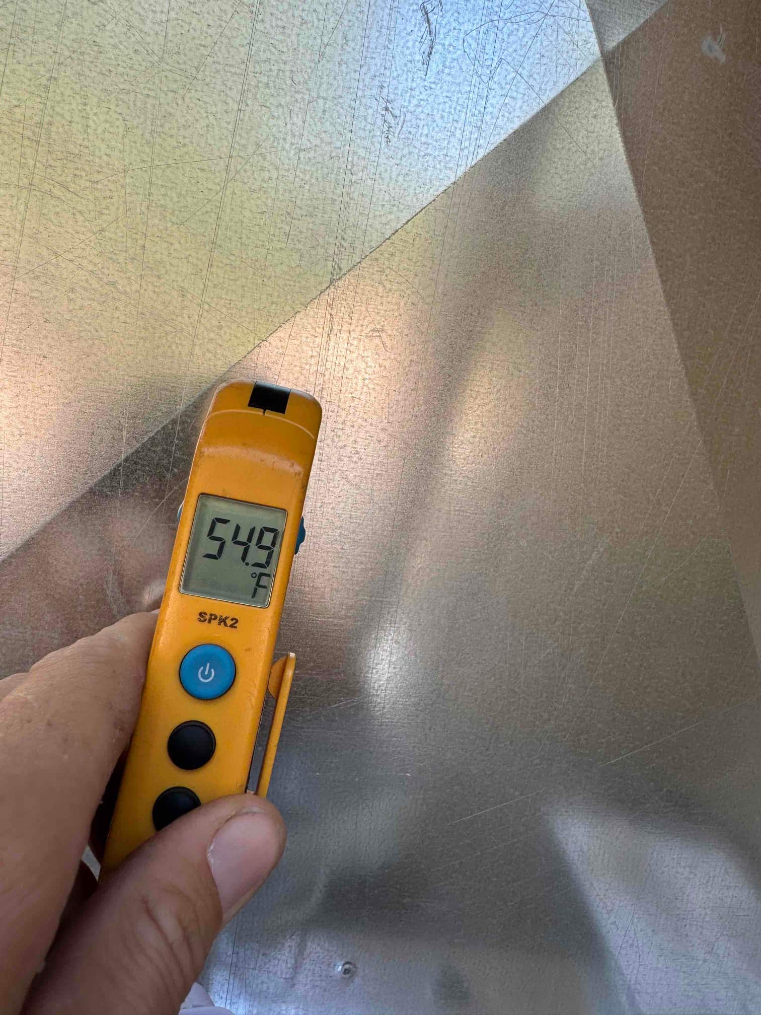 Diagnostic instrument display shows 54.9 °F.
