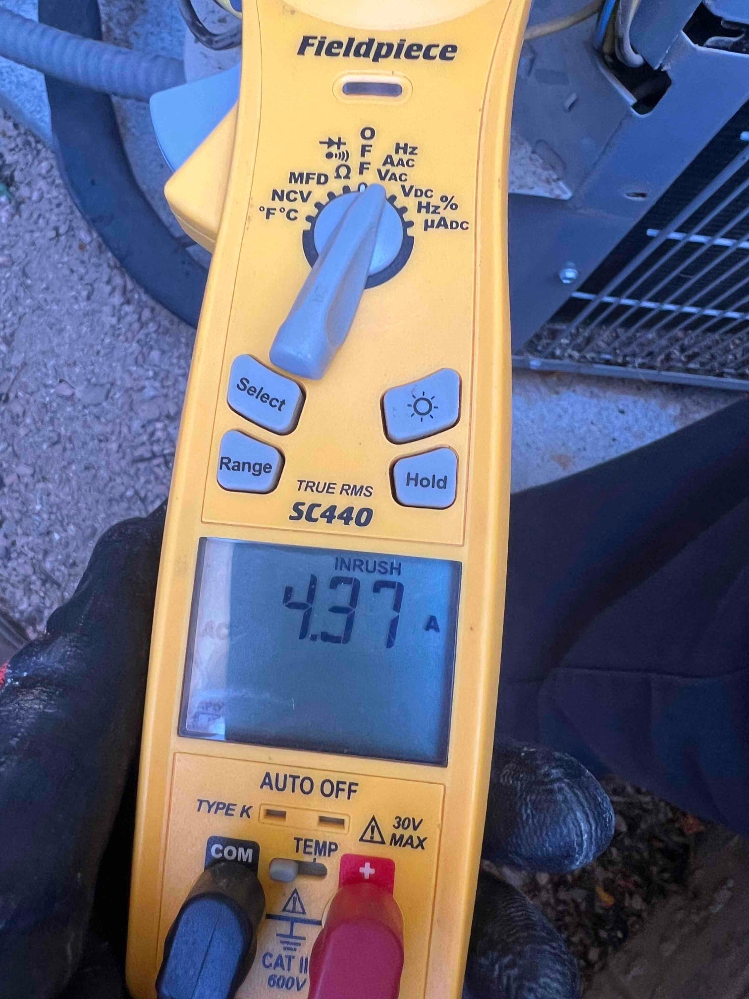 Diagnostic instrument display shows 4.37 A.