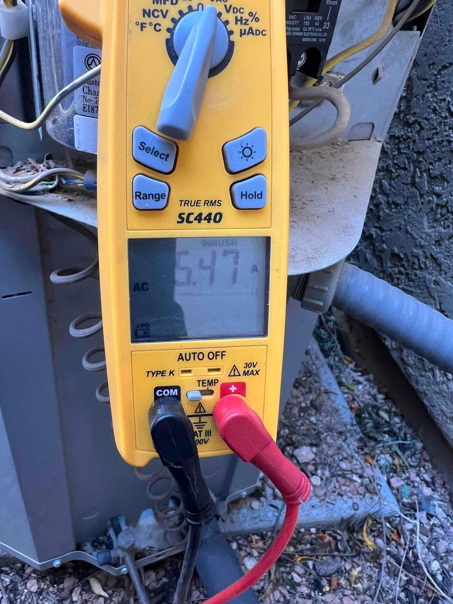 Diagnostic instrument display shows 5.47 A.