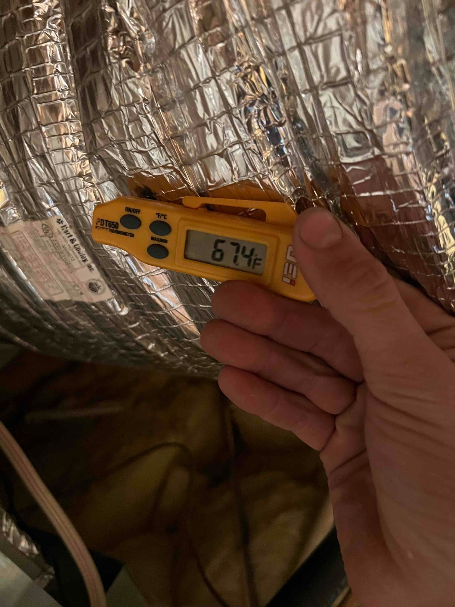 Diagnostic instrument display shows 67.4 °F.