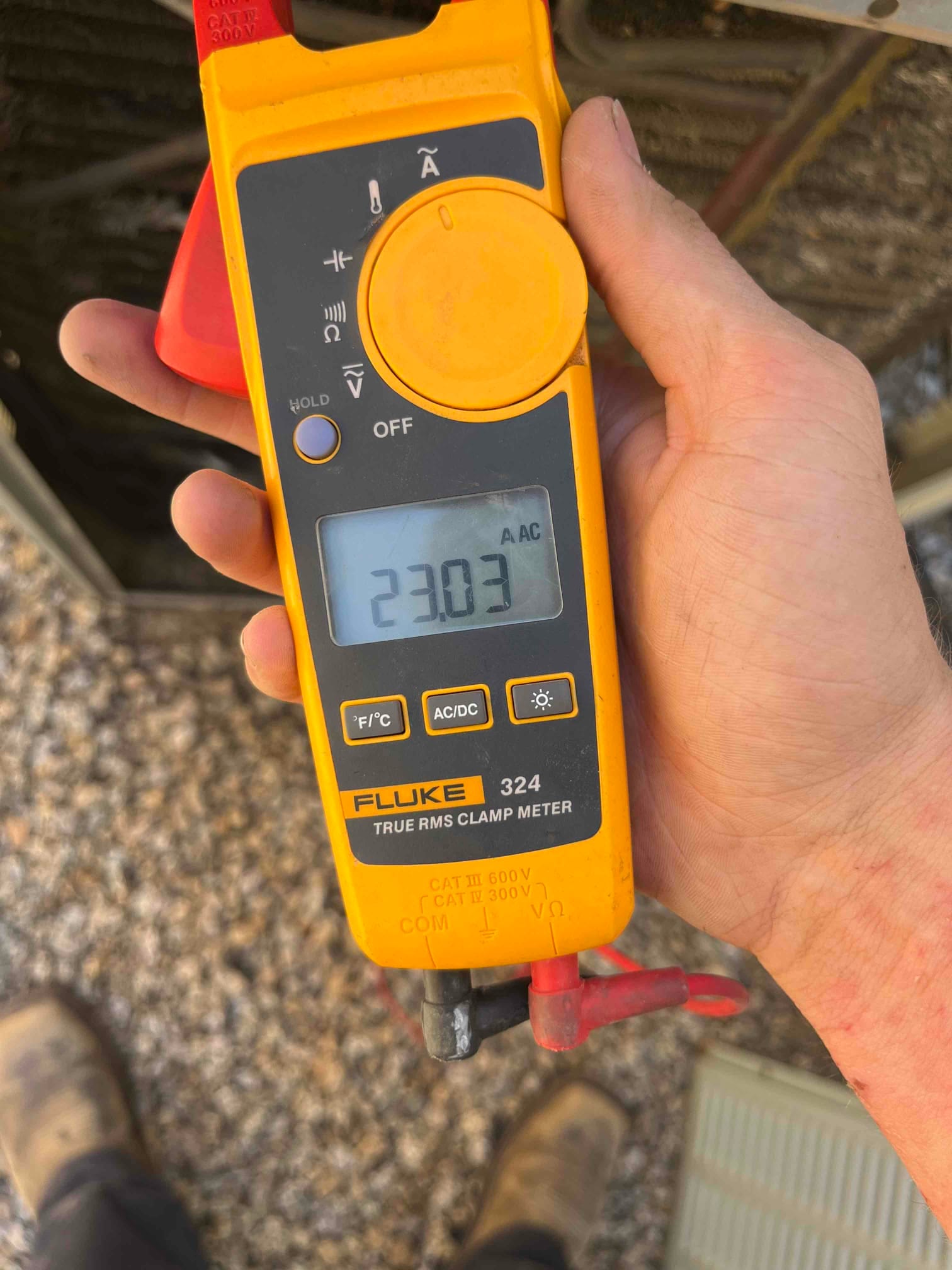 HVAC diagnostic instrument photographed during the service visit.