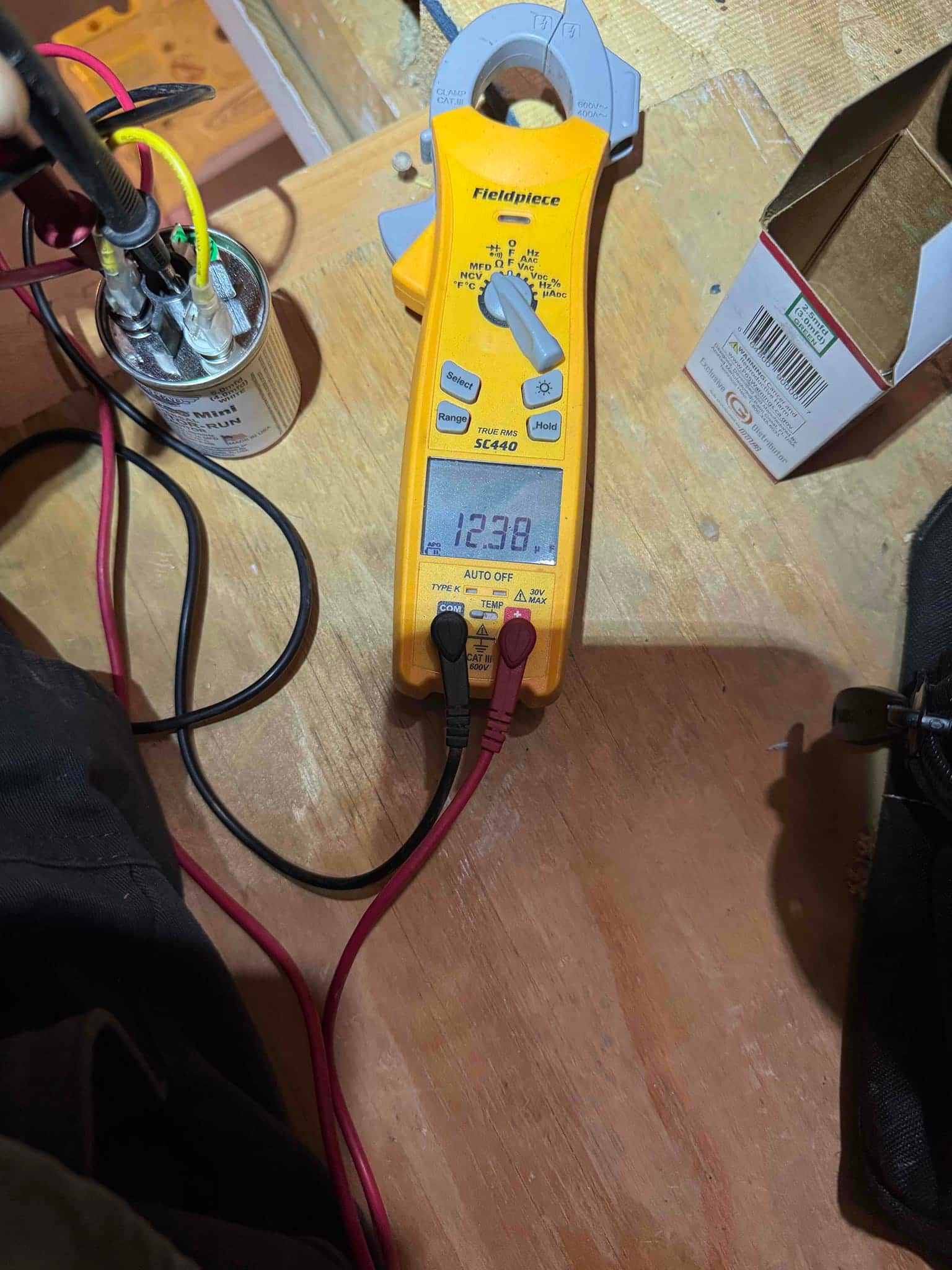 HVAC diagnostic instrument photographed during the service visit.