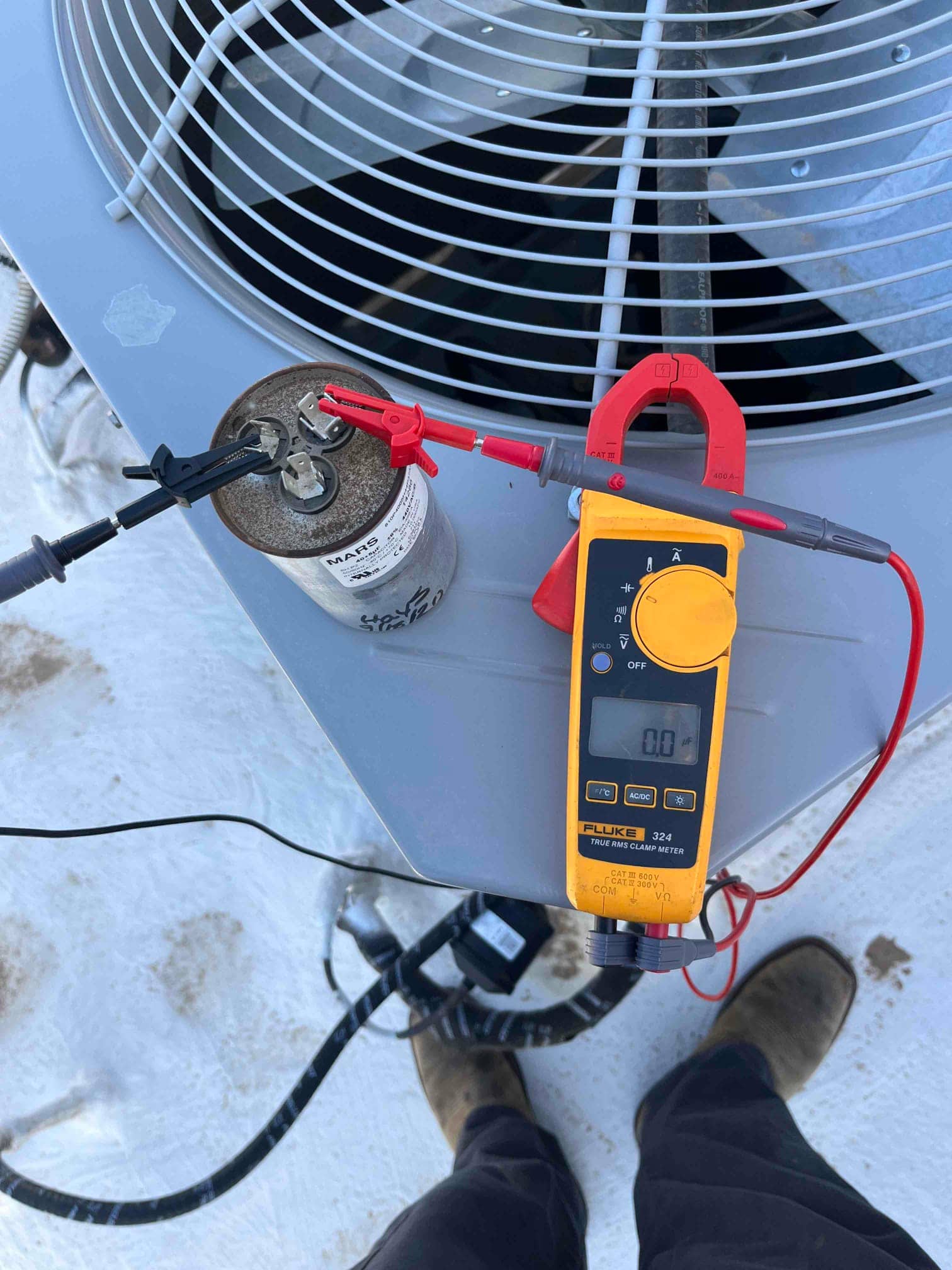 HVAC diagnostic instrument photographed during the service visit.