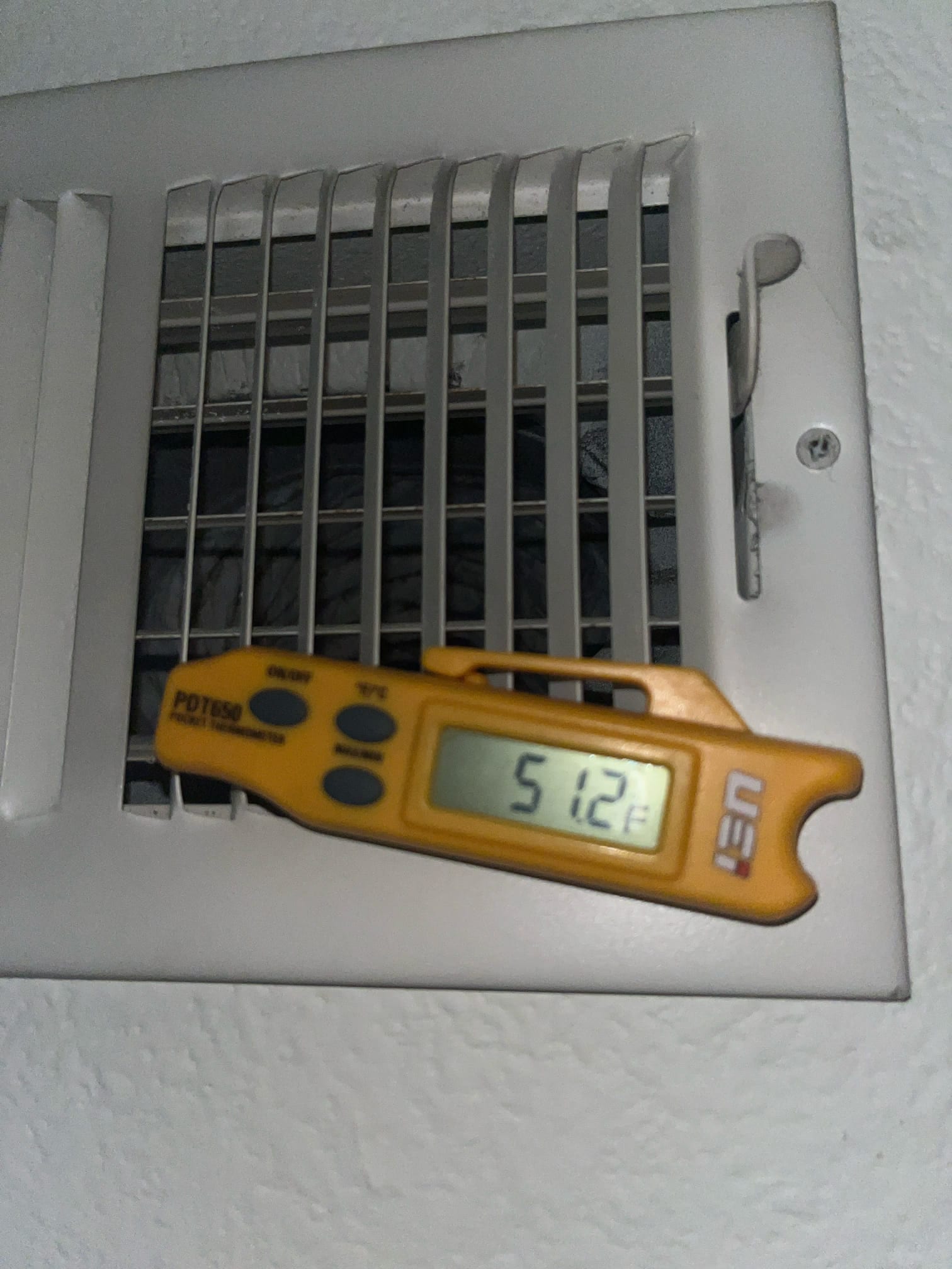 HVAC diagnostic instrument photographed during the service visit.