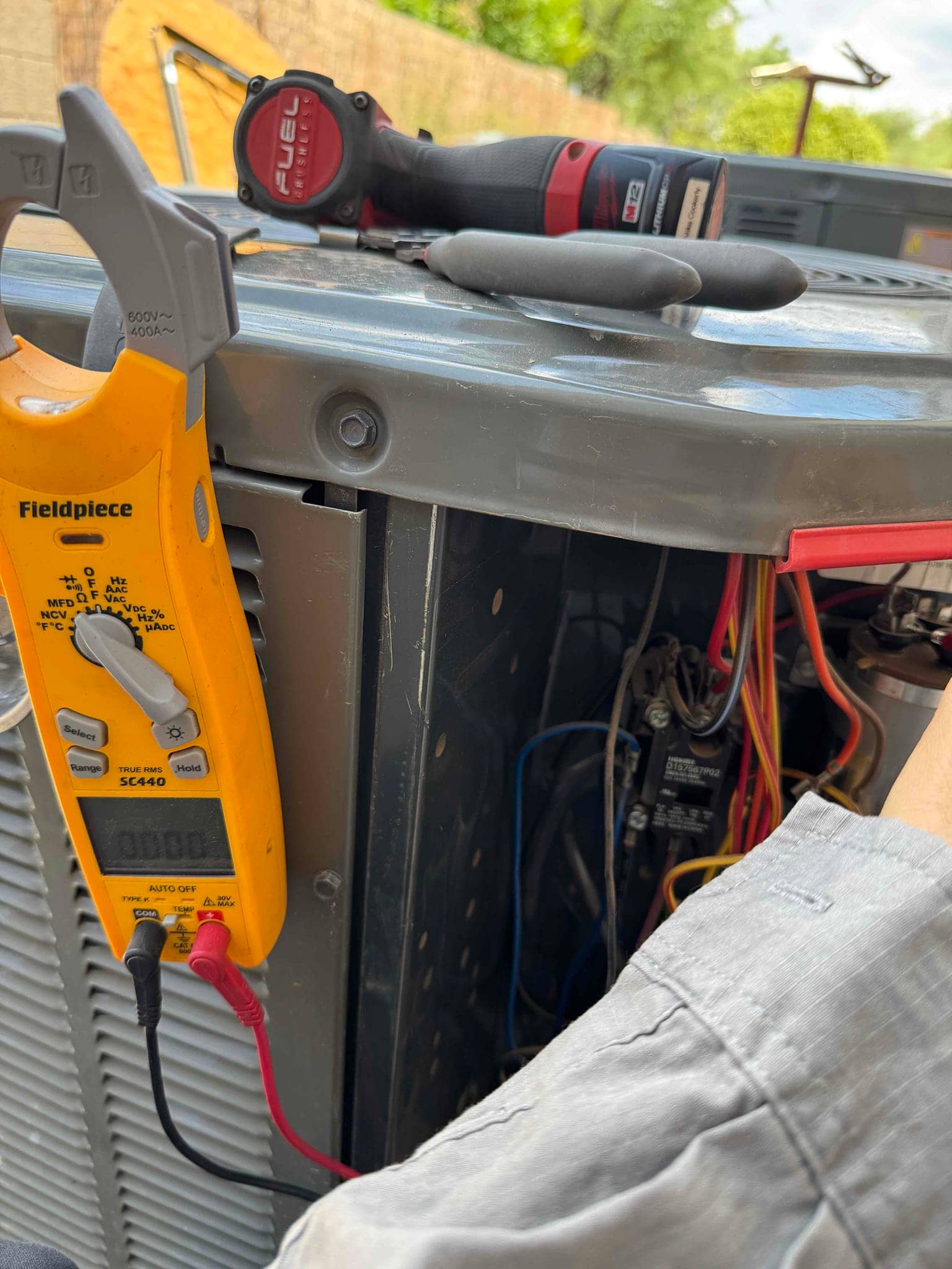 HVAC diagnostic instrument photographed during the service visit.
