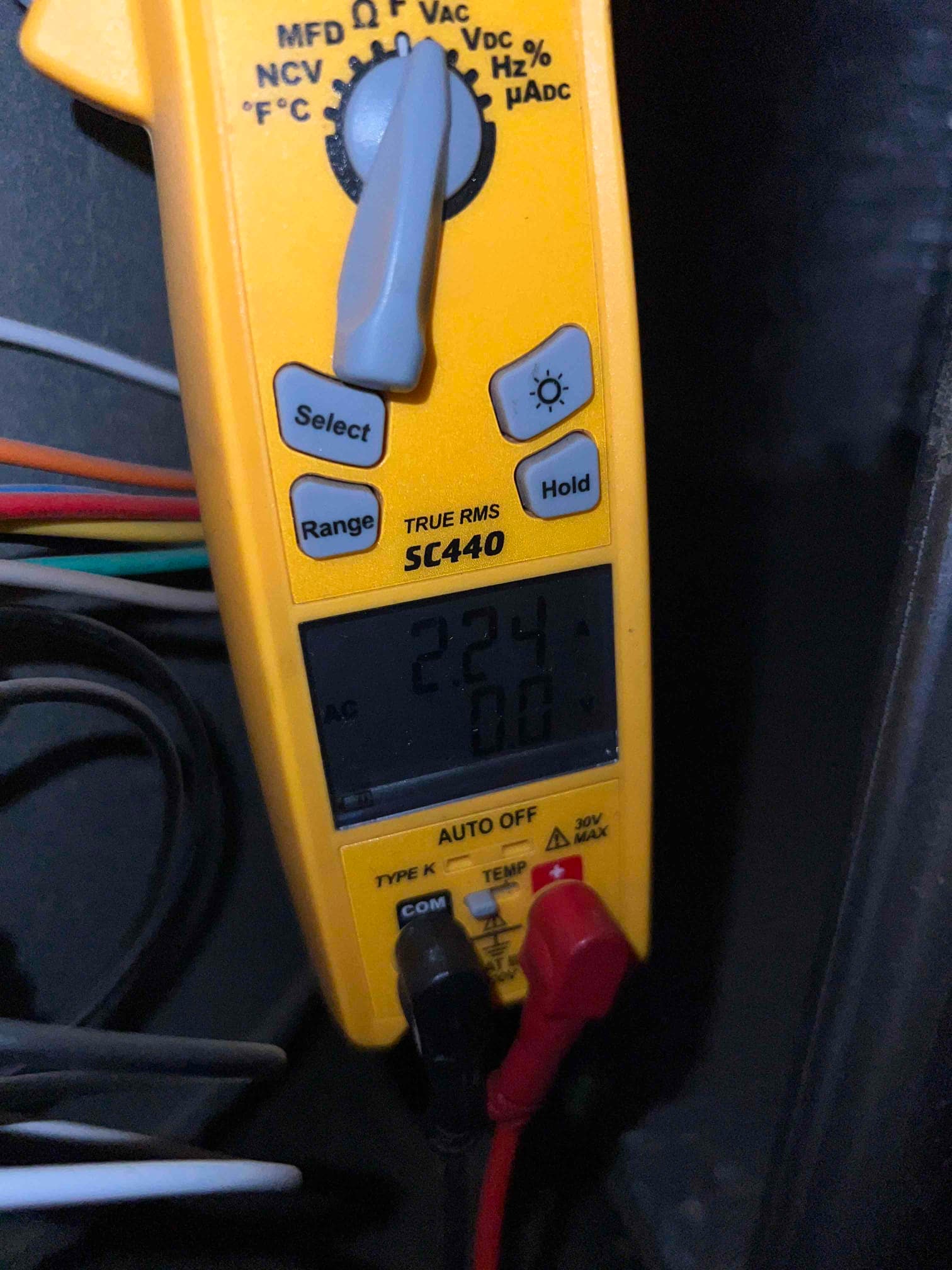 HVAC diagnostic instrument photographed during the service visit.