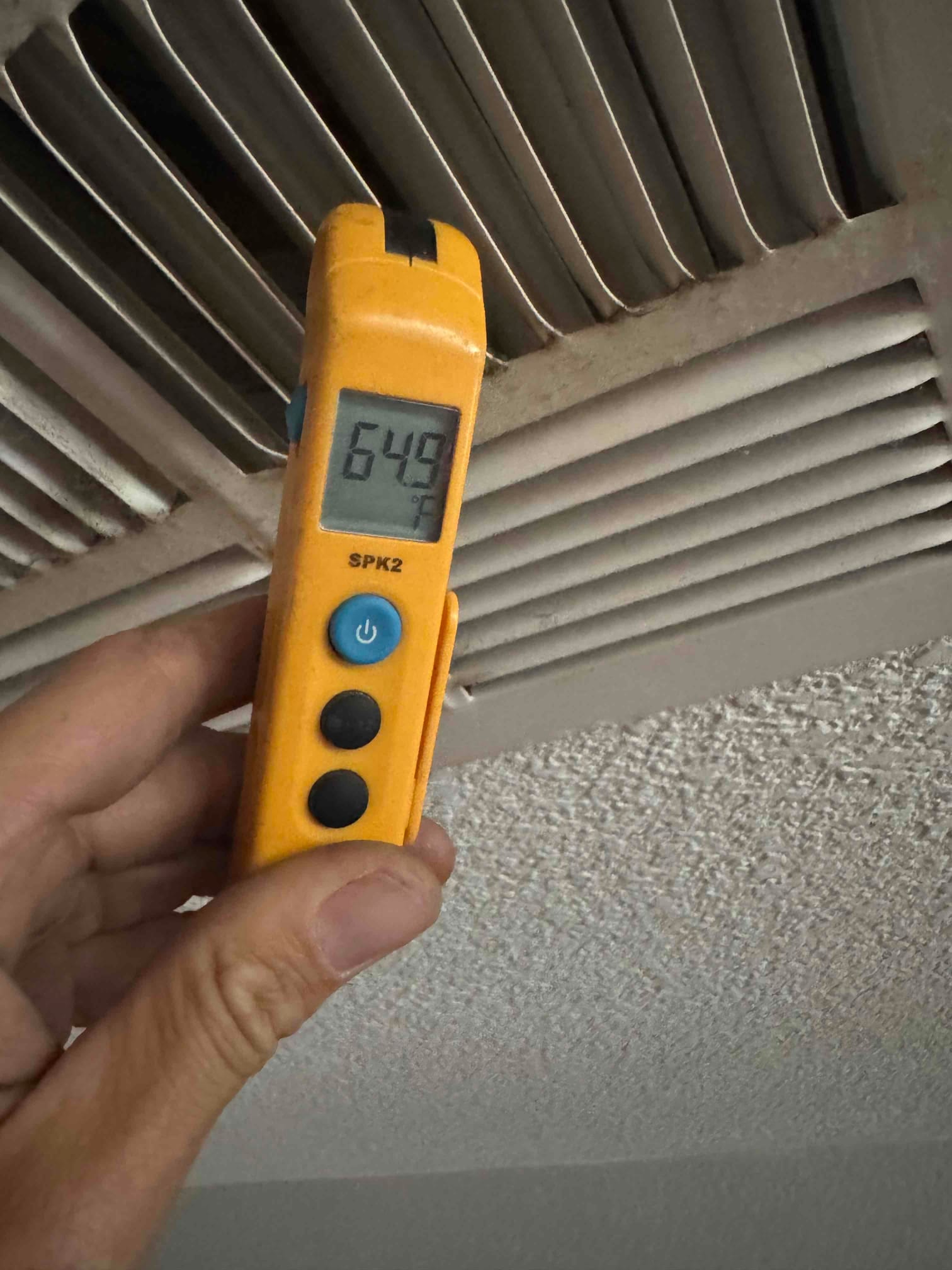 Diagnostic instrument display shows 64.9 °F.