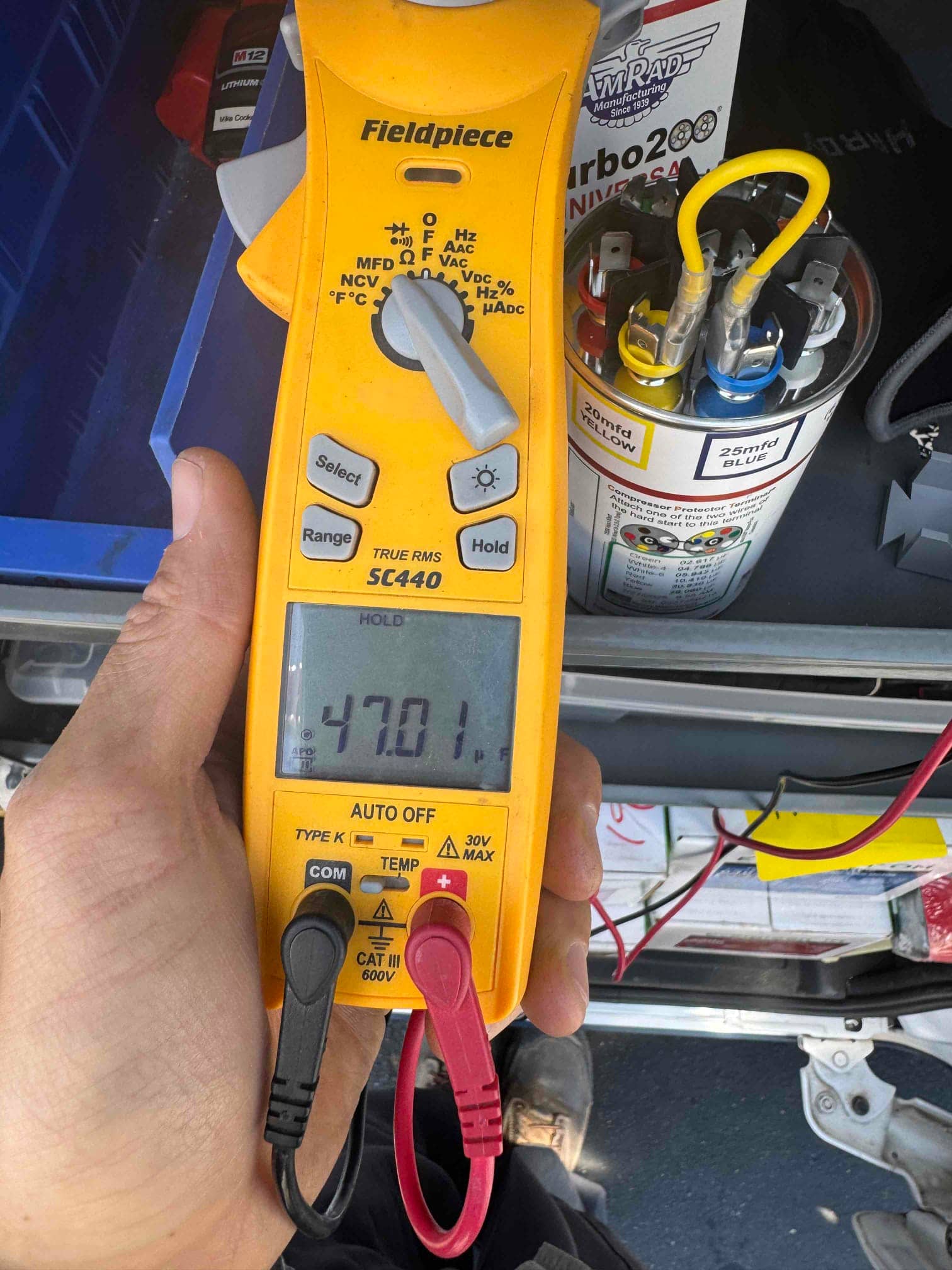 HVAC diagnostic instrument photographed during the service visit.