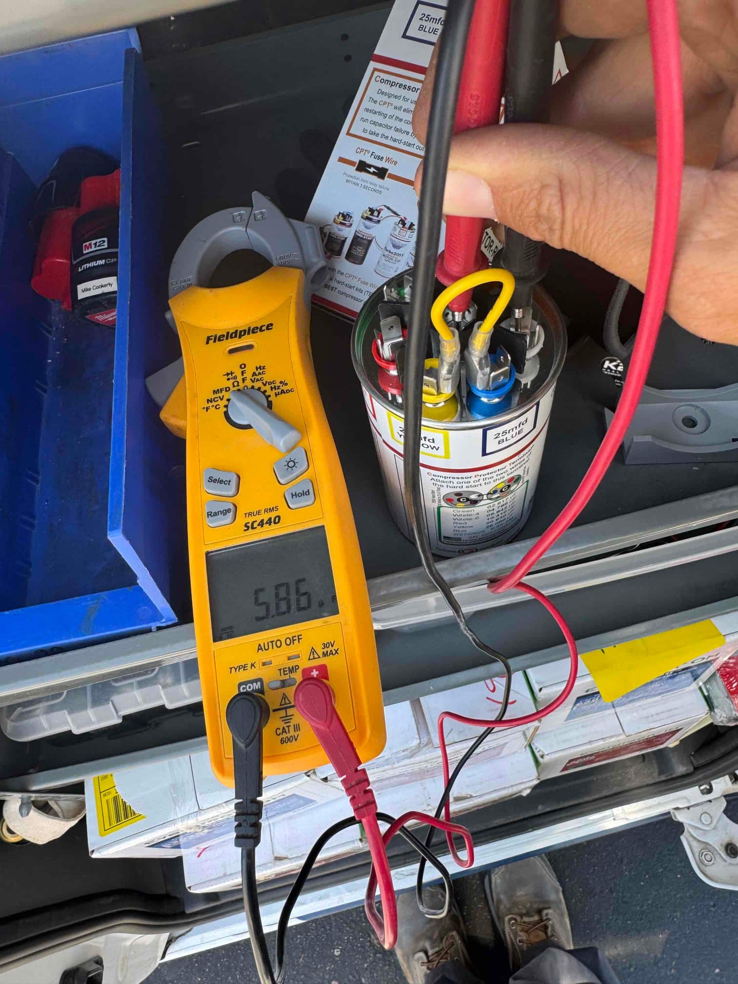 HVAC diagnostic instrument photographed during the service visit.
