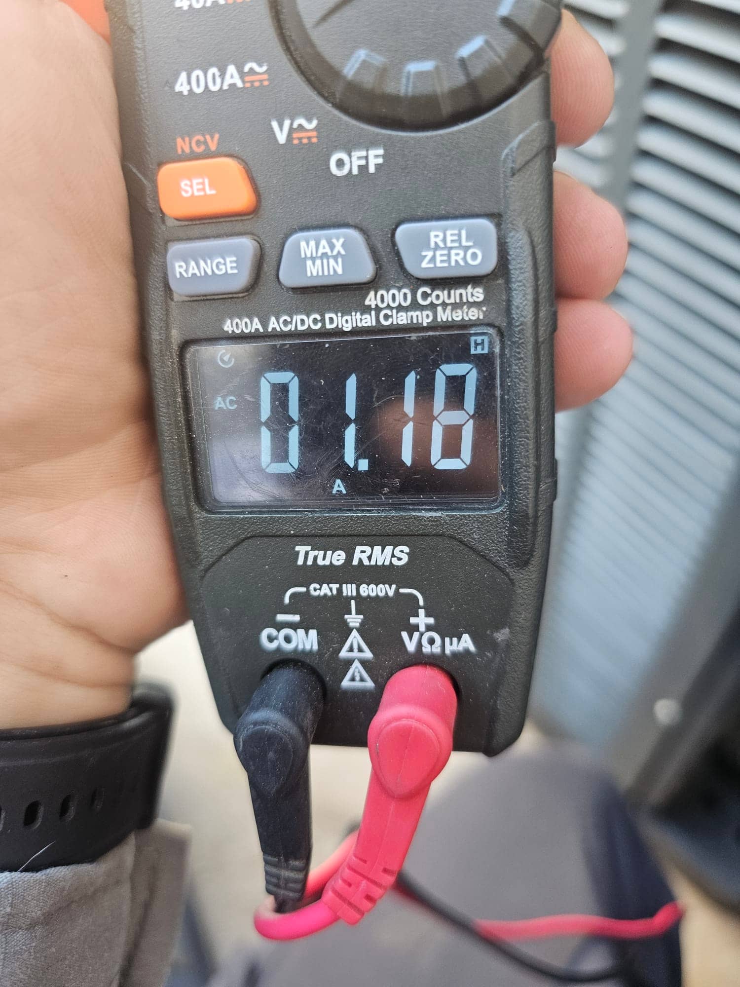 Diagnostic instrument display shows 1.18 A.