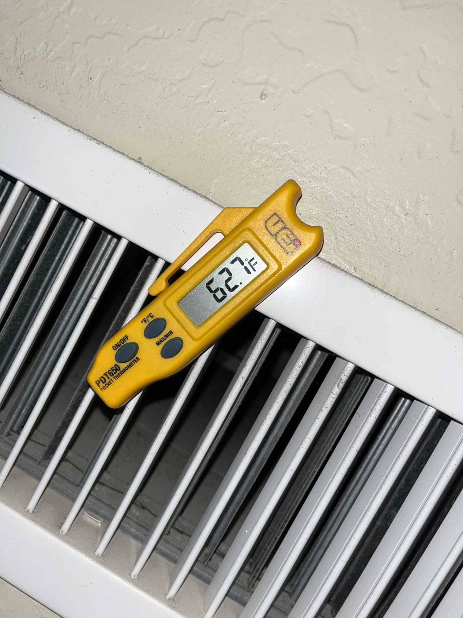 Diagnostic instrument display shows 62.7 °F.