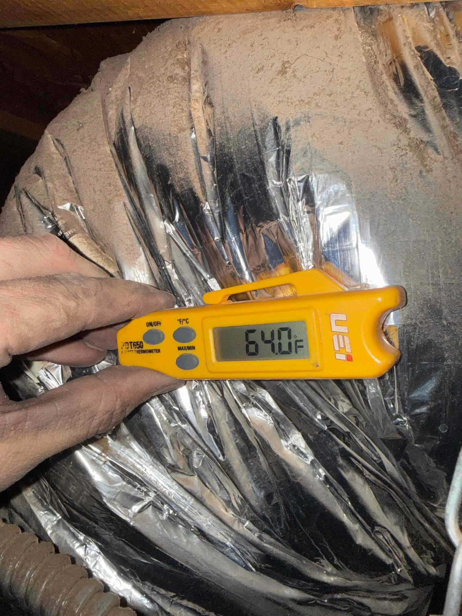 Diagnostic instrument display shows 64 °F.