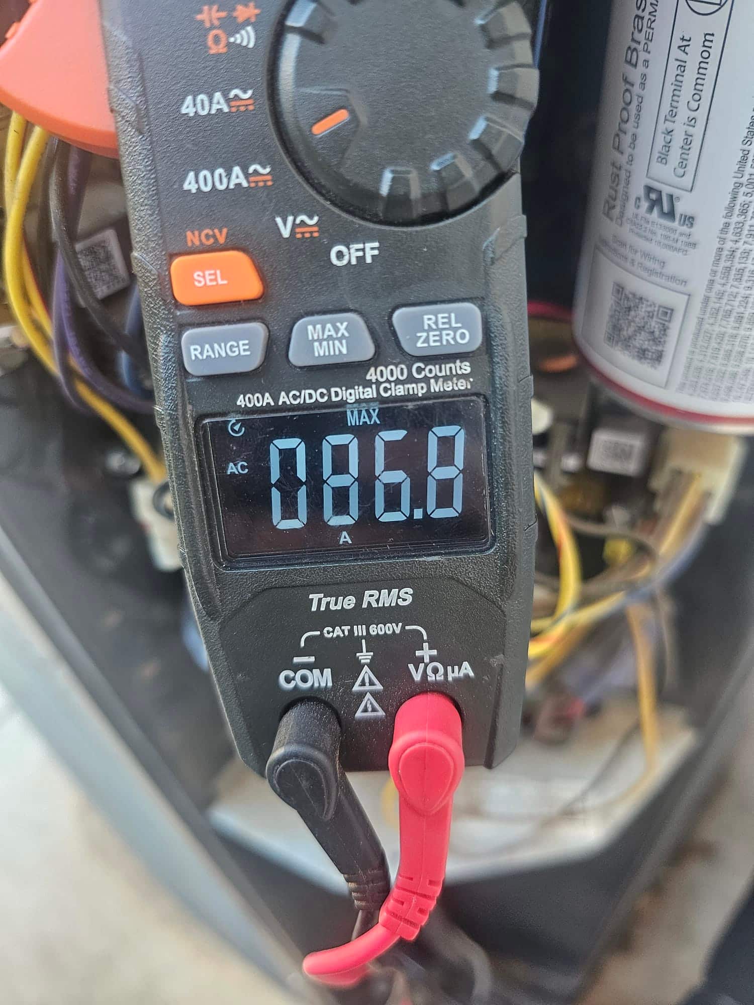 Diagnostic instrument display shows 86.8 A.