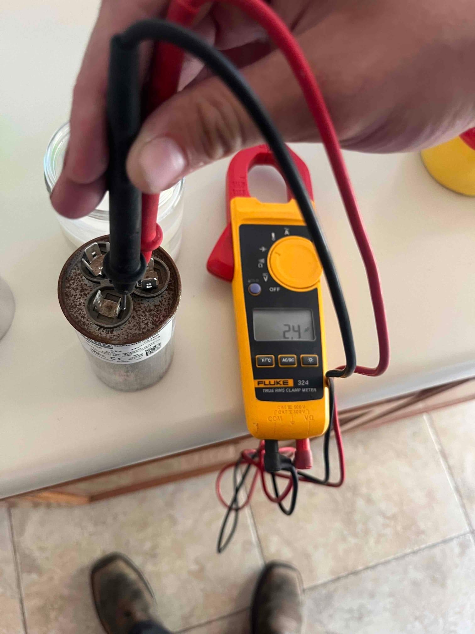 HVAC diagnostic instrument photographed during the service visit.