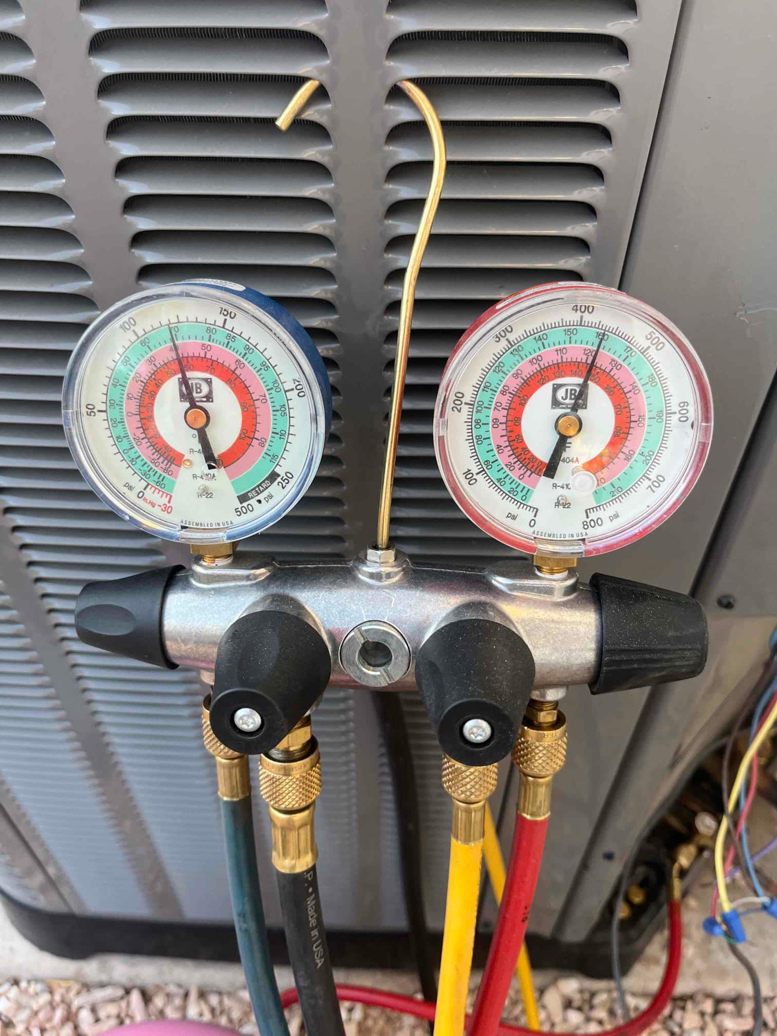 HVAC diagnostic instrument photographed during the service visit.