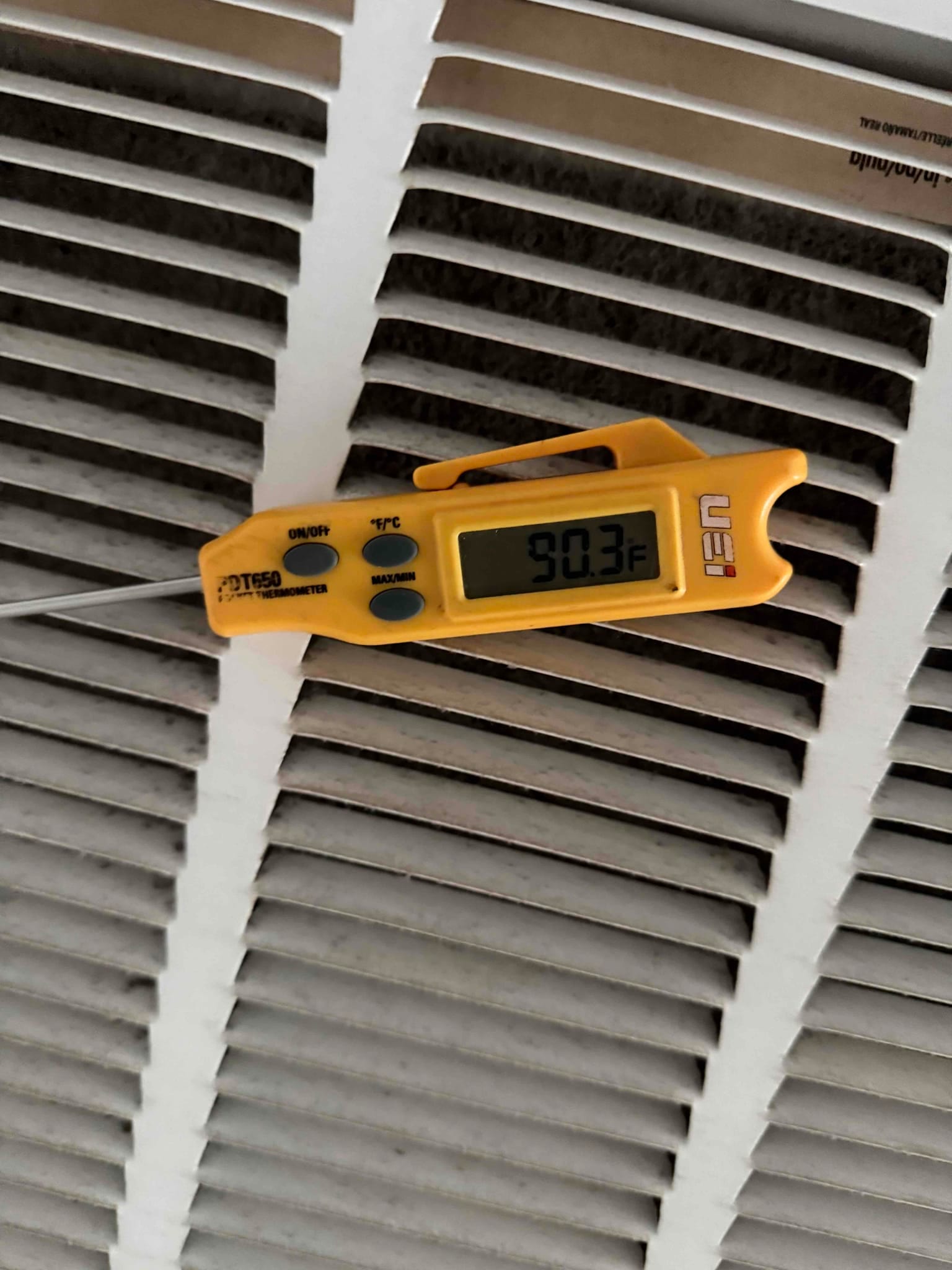 HVAC diagnostic instrument photographed during the service visit.