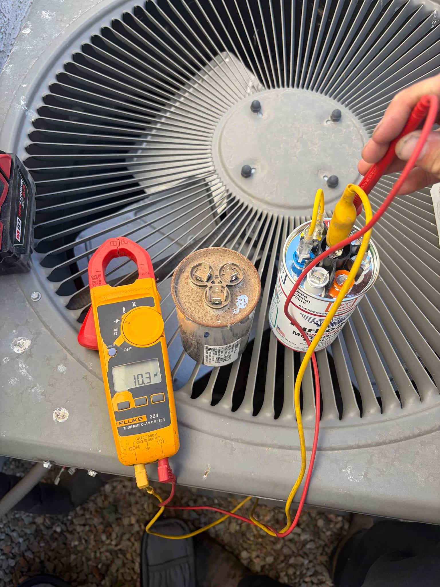 HVAC diagnostic instrument photographed during the service visit.