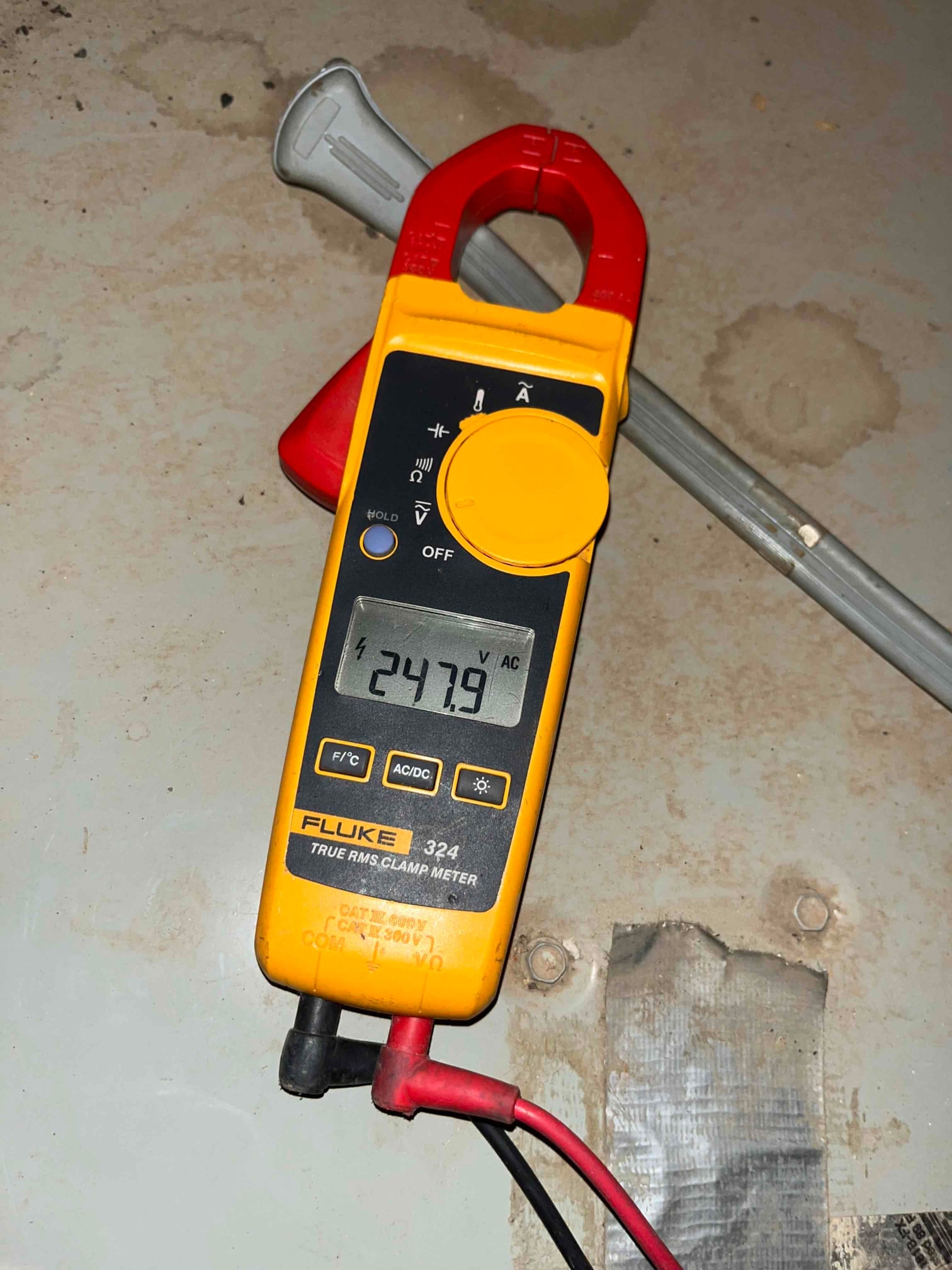 HVAC diagnostic instrument photographed during the service visit.