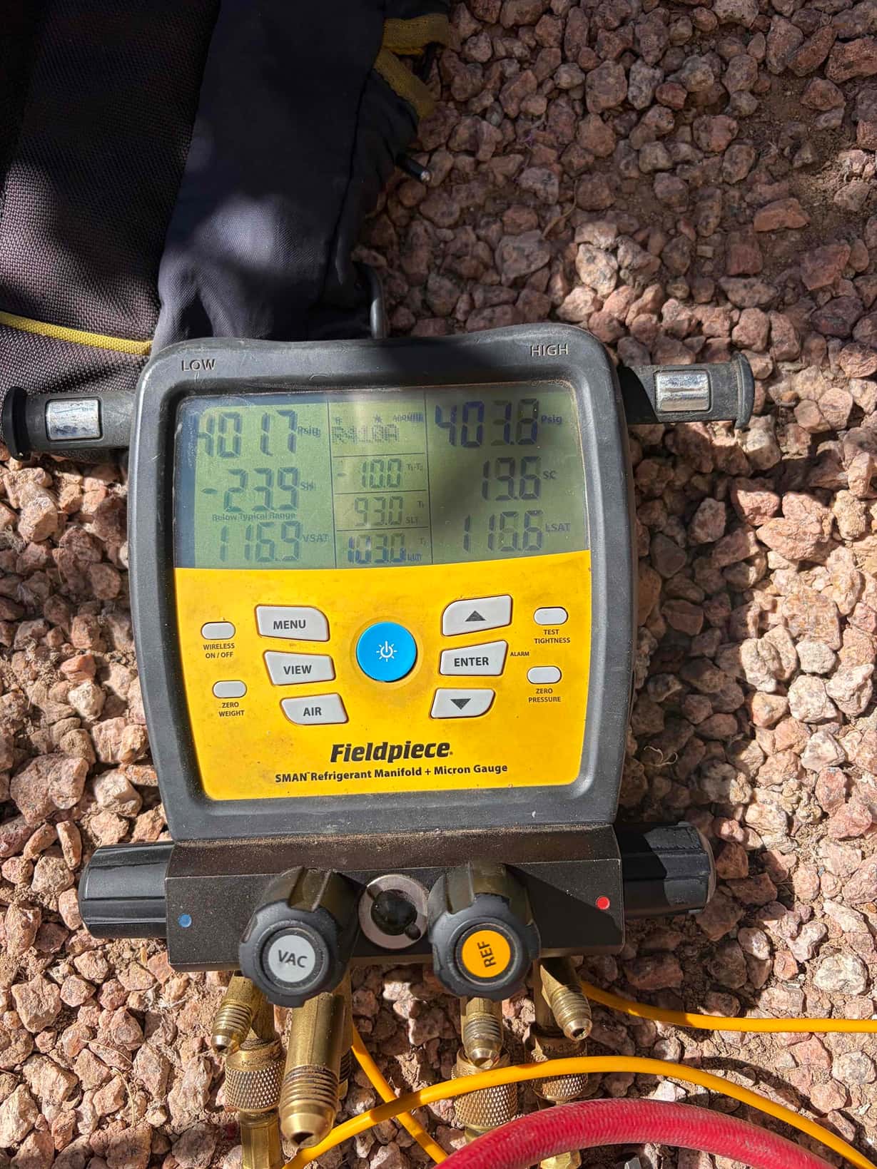 HVAC diagnostic instrument photographed during the service visit.