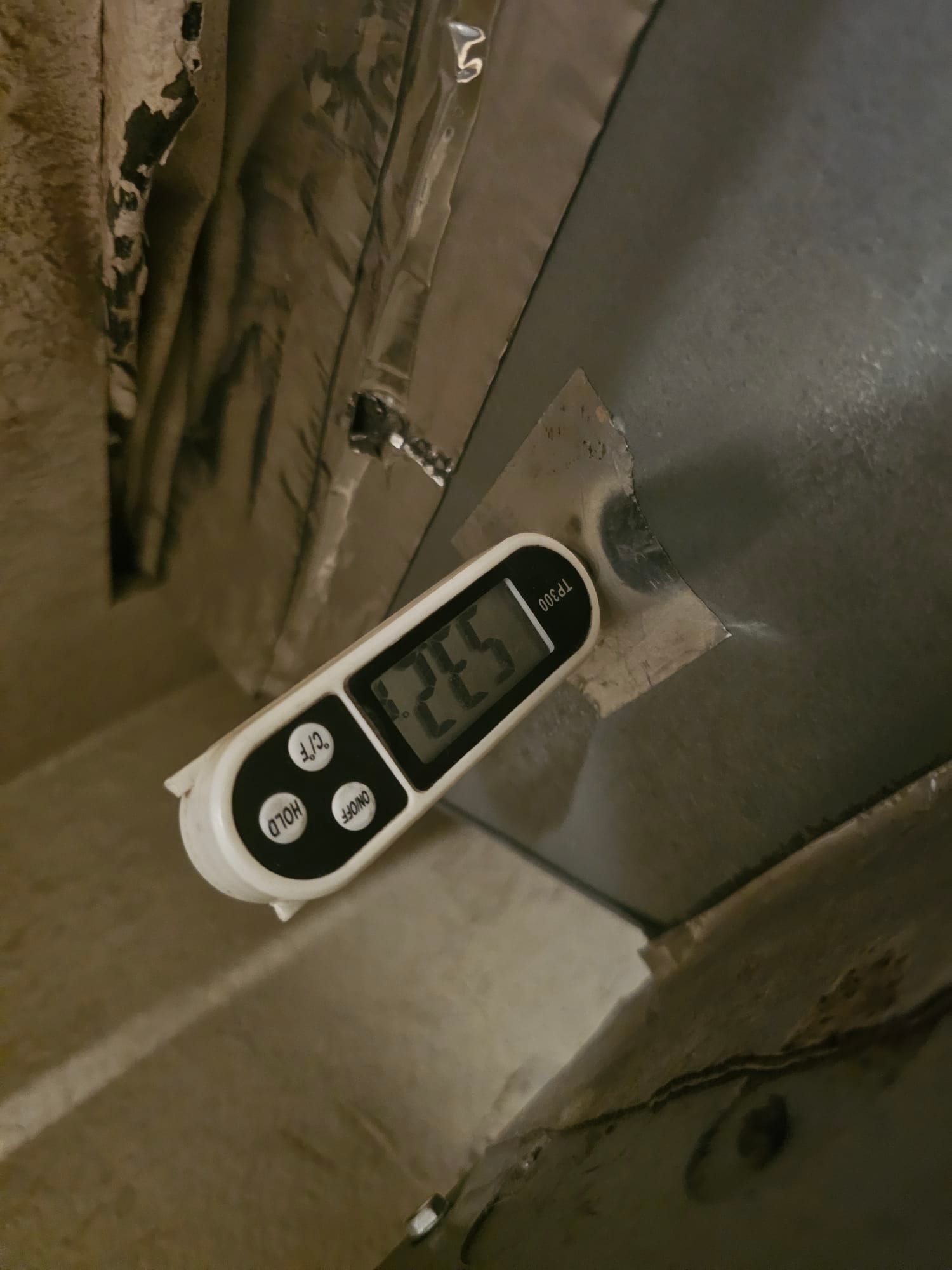 HVAC diagnostic instrument photographed during the service visit.