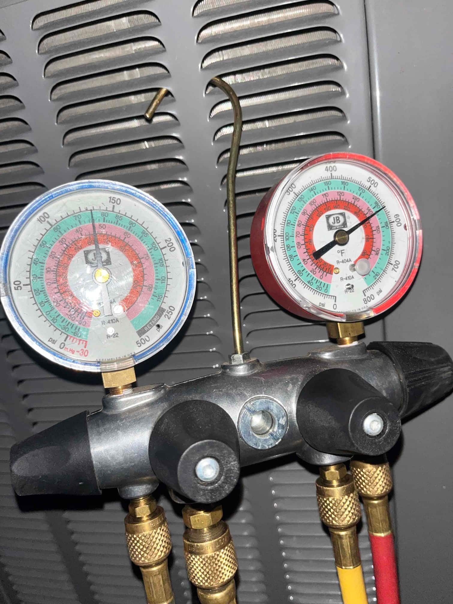 HVAC diagnostic instrument photographed during the service visit.