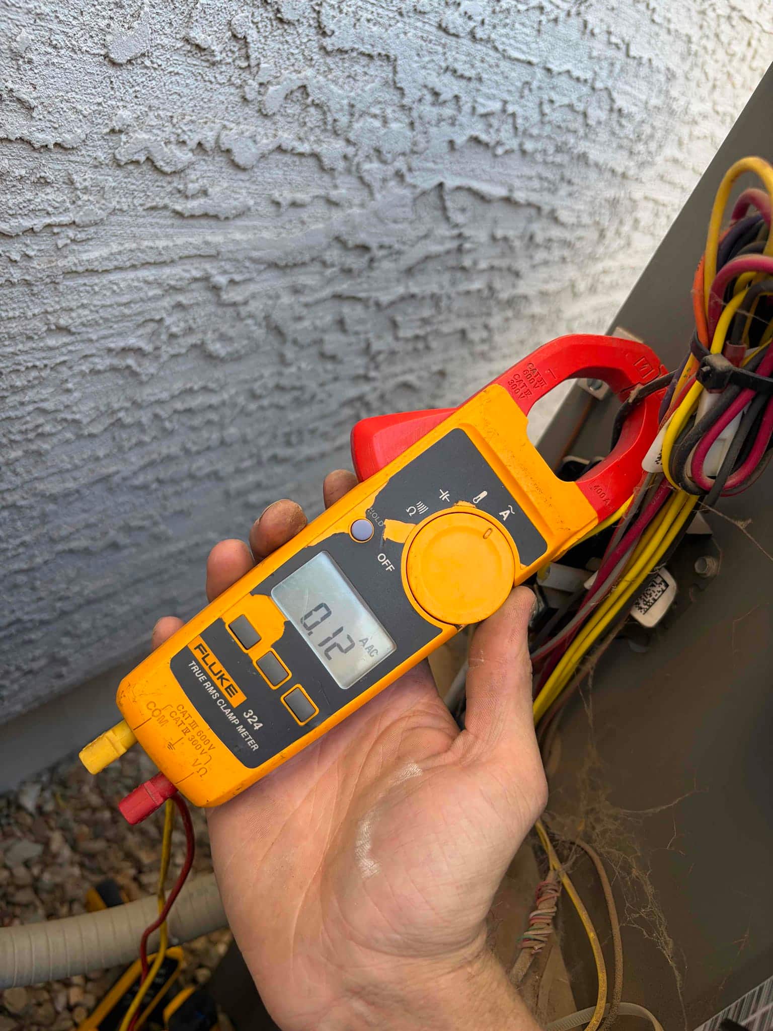 HVAC diagnostic instrument photographed during the service visit.