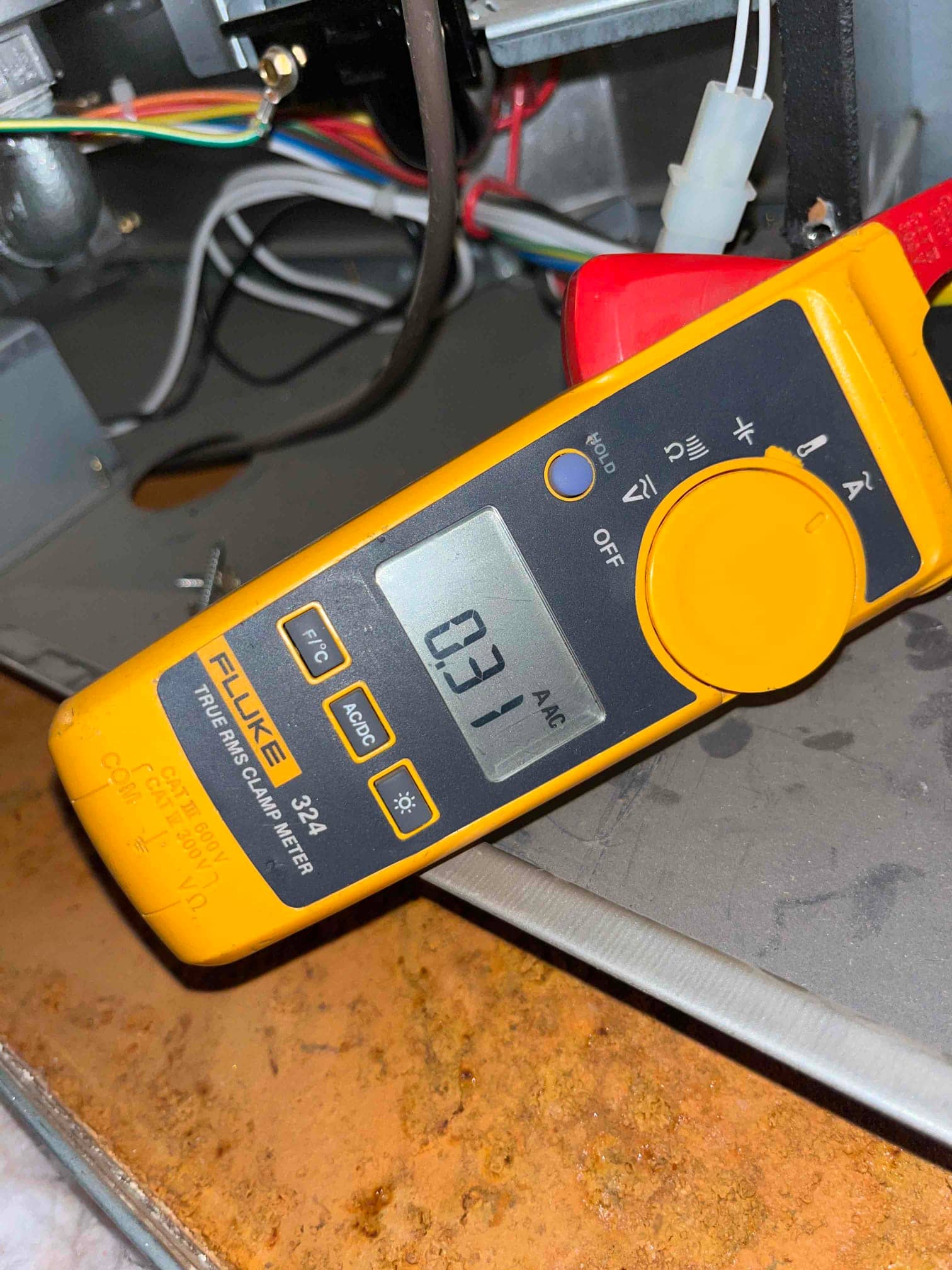 HVAC diagnostic instrument photographed during the service visit.