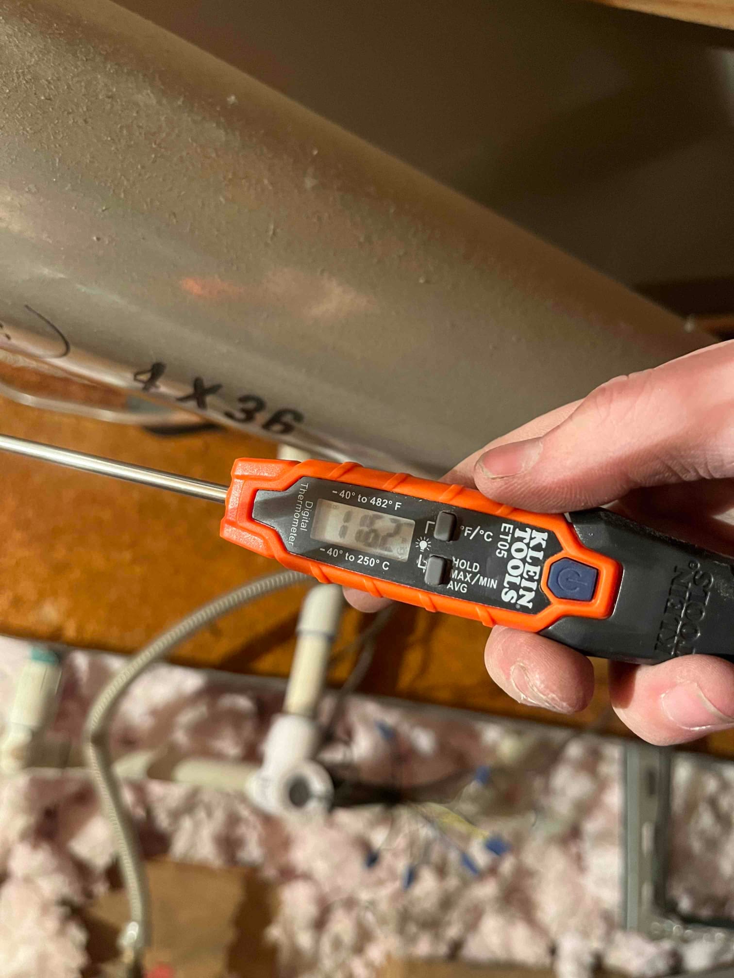 HVAC diagnostic instrument photographed during the service visit.