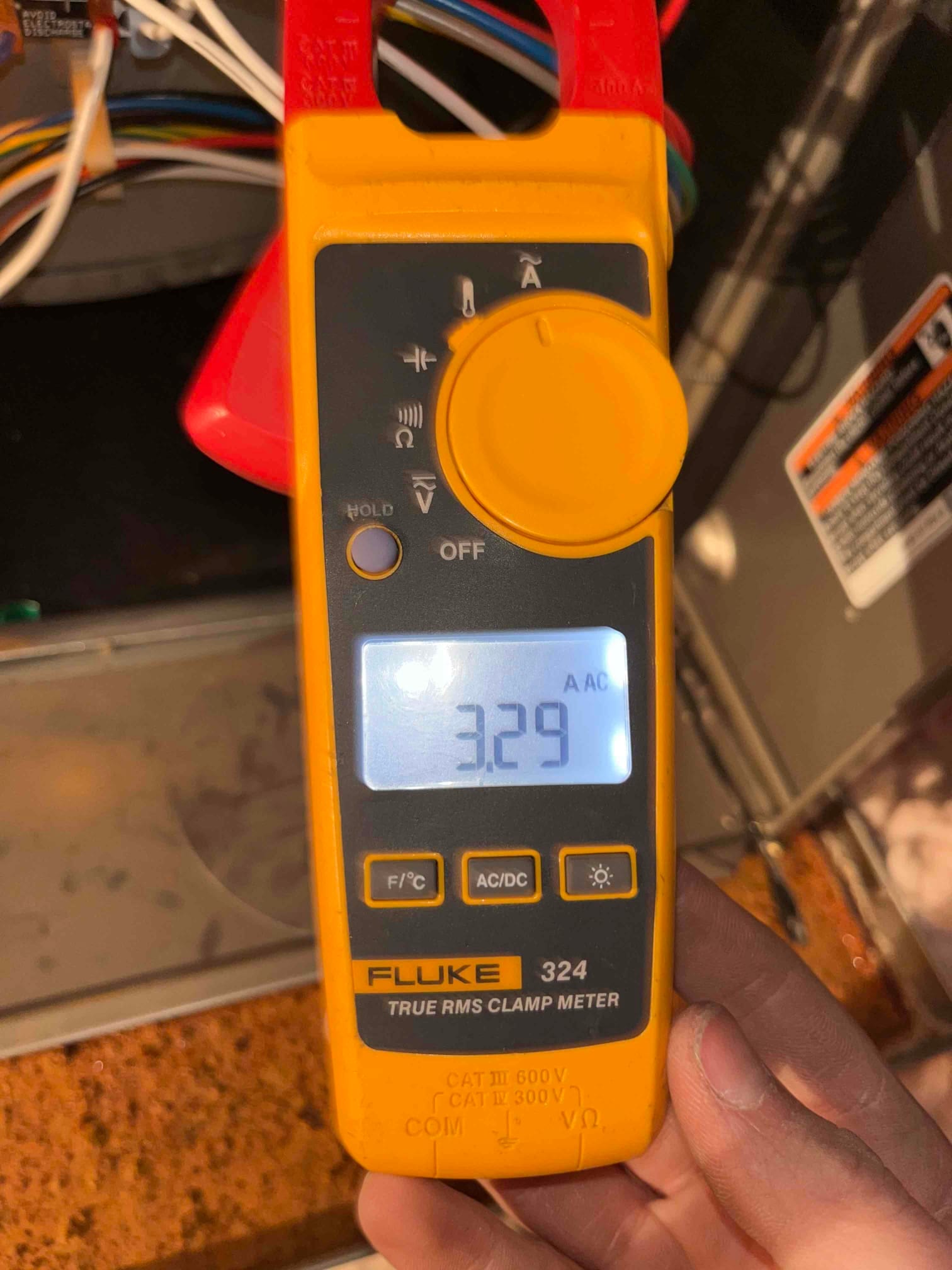 HVAC diagnostic instrument photographed during the service visit.