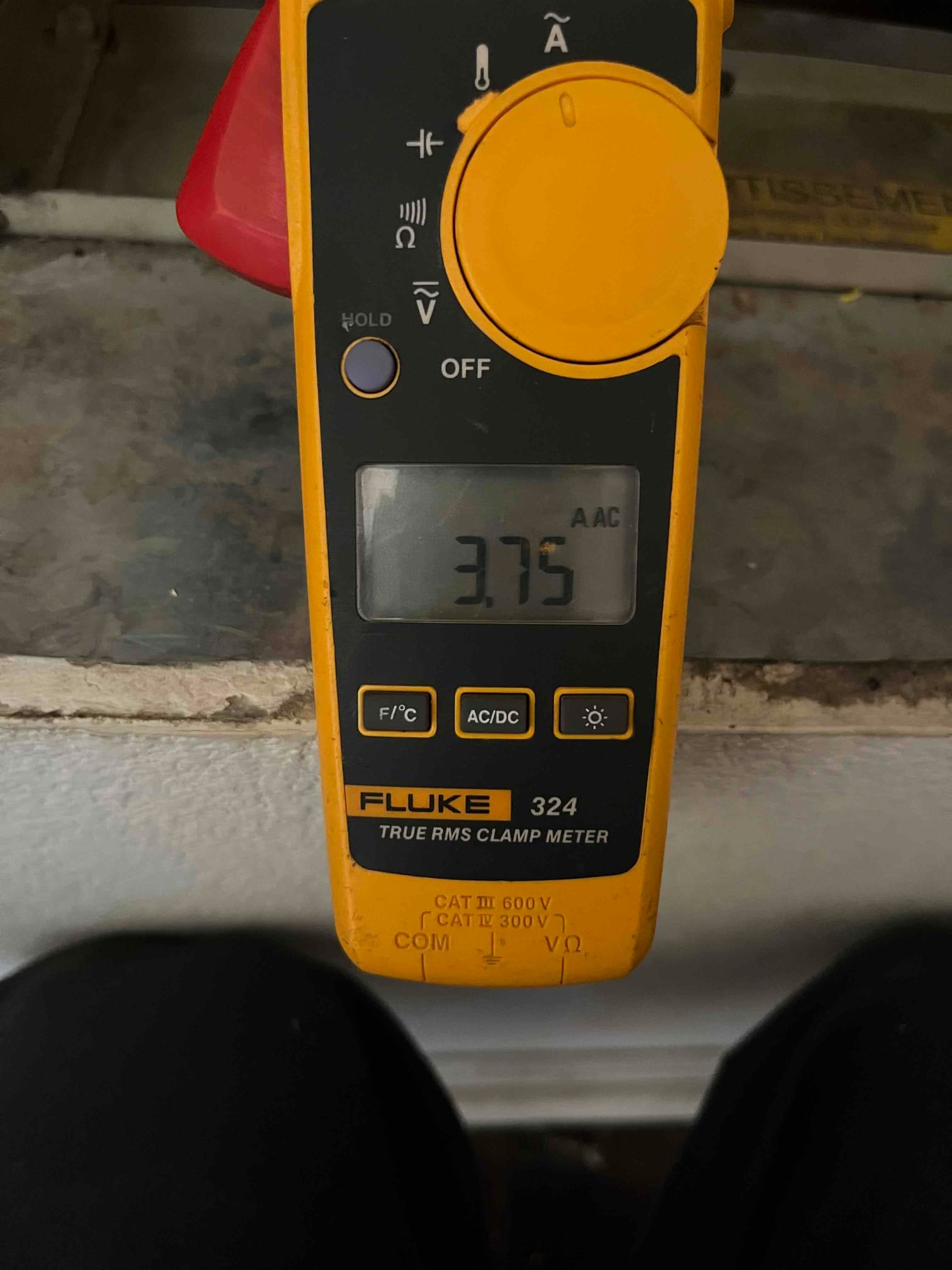 HVAC diagnostic instrument photographed during the service visit.