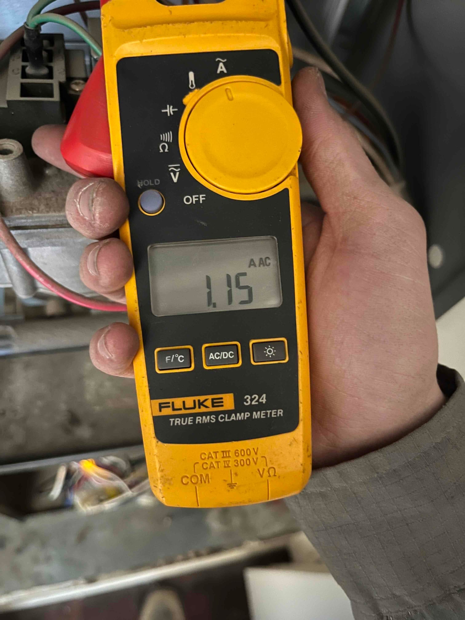 HVAC diagnostic instrument photographed during the service visit.