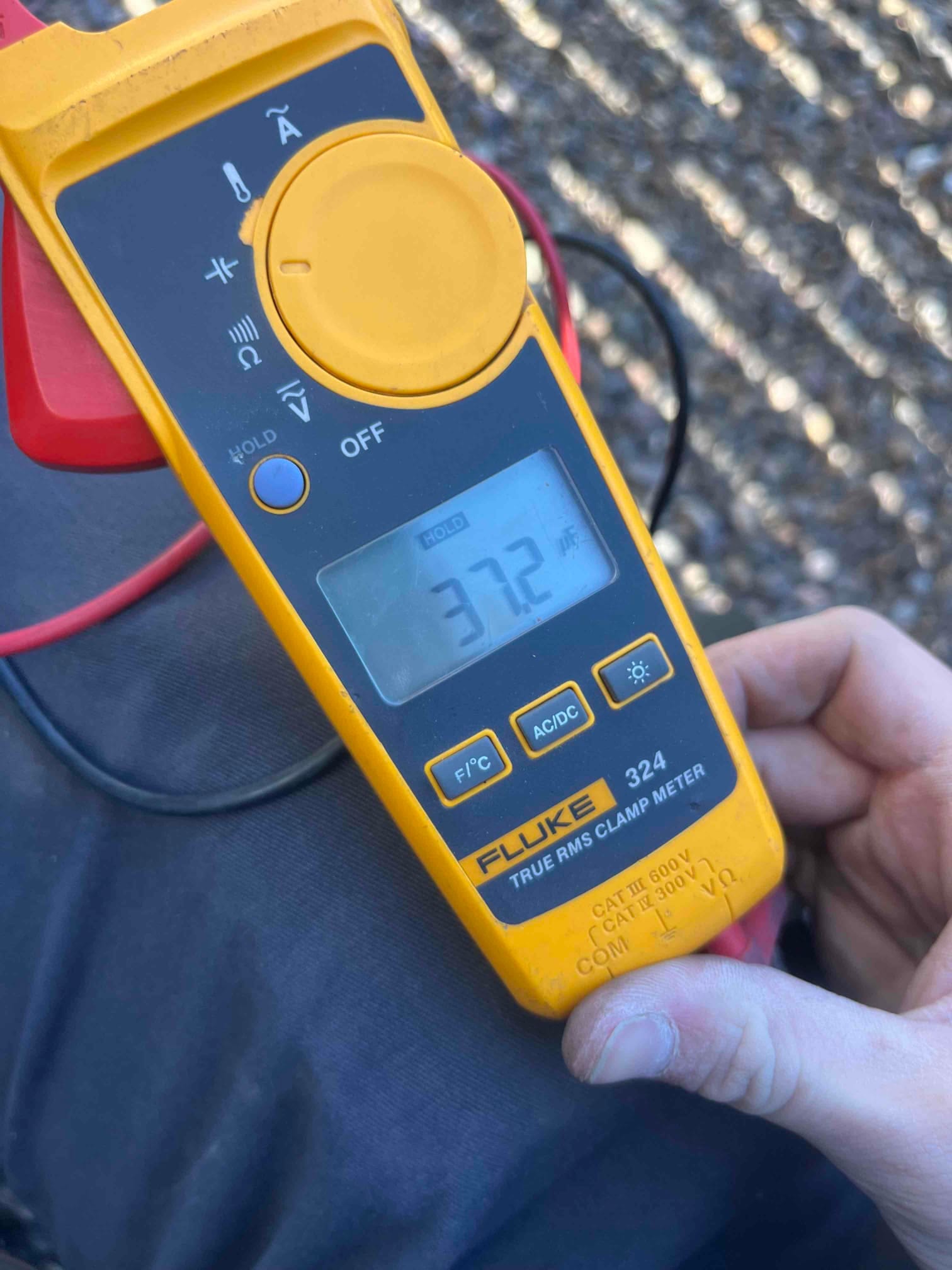 HVAC diagnostic instrument photographed during the service visit.