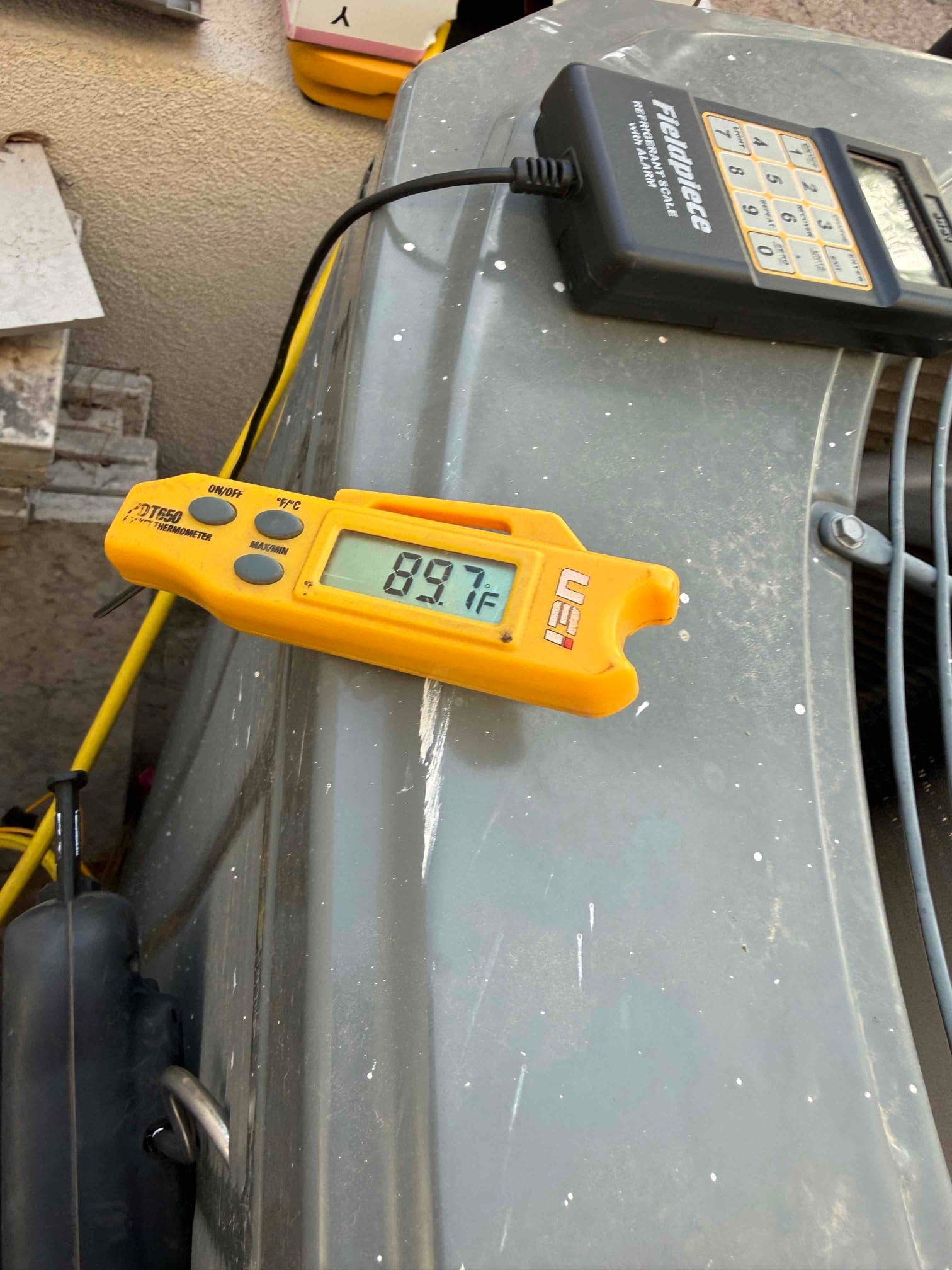 Diagnostic instrument display shows 89.7 °F.