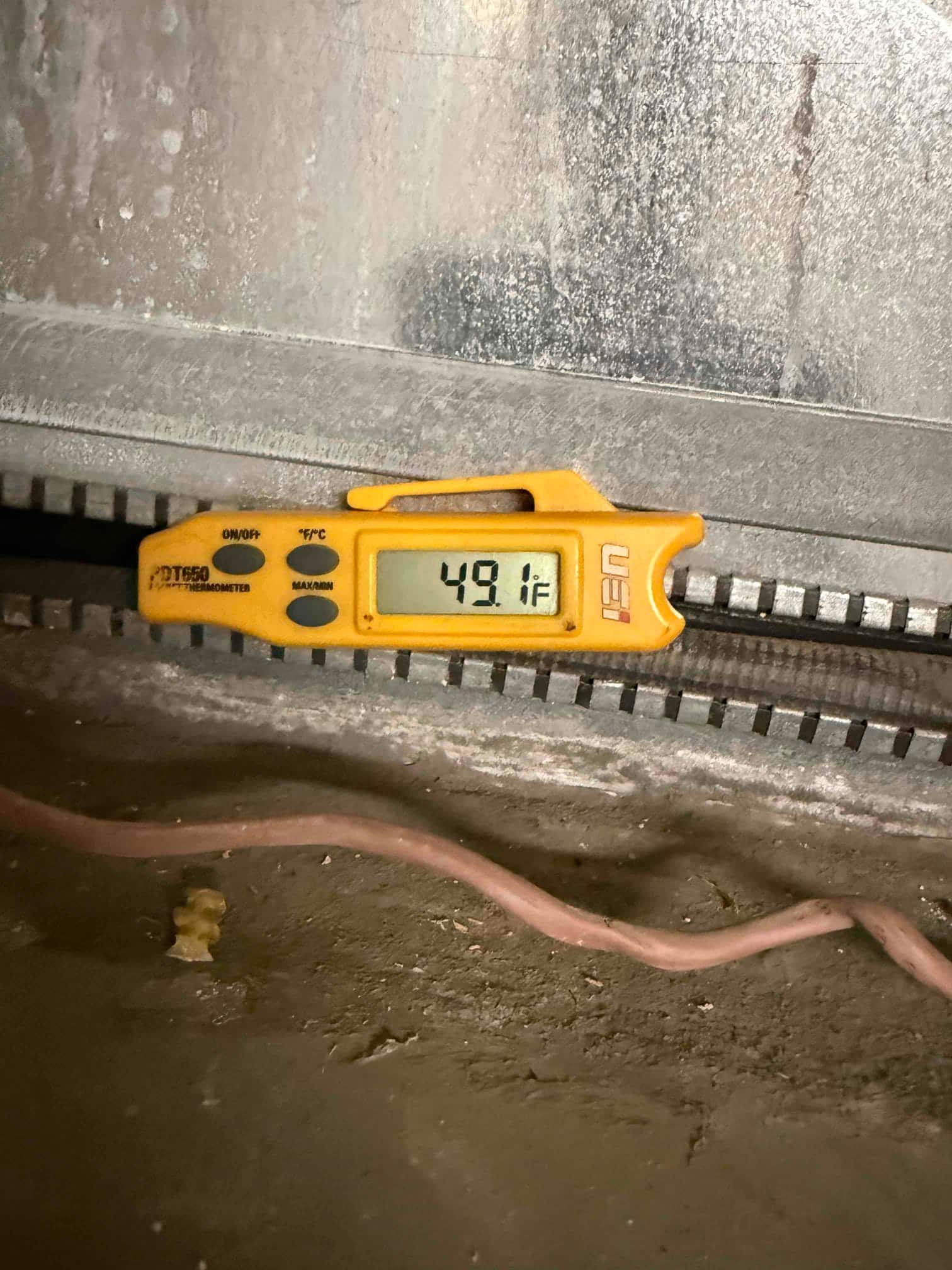 HVAC diagnostic instrument photographed during the service visit.