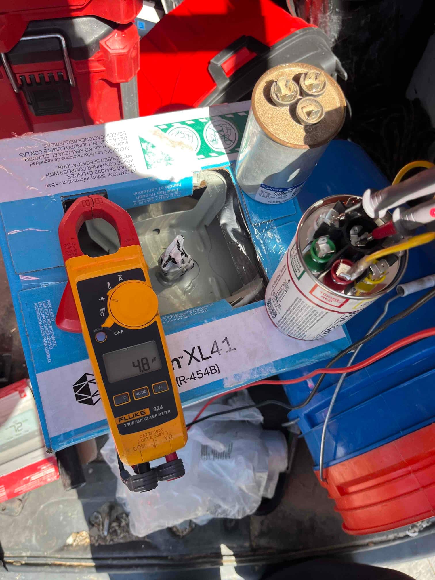 Diagnostic instrument display shows 48 μF.