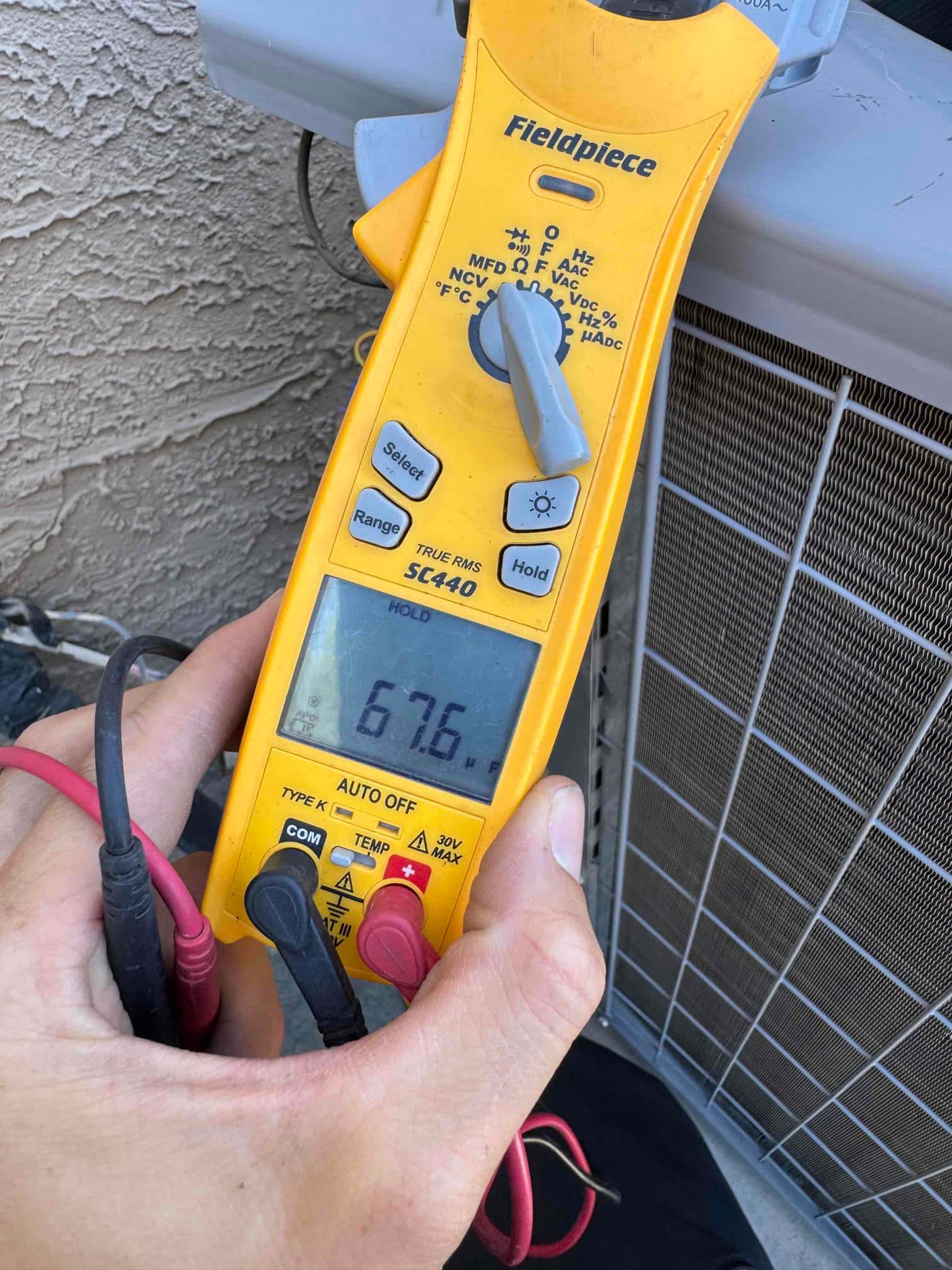 Diagnostic instrument display shows 67.6 °F.