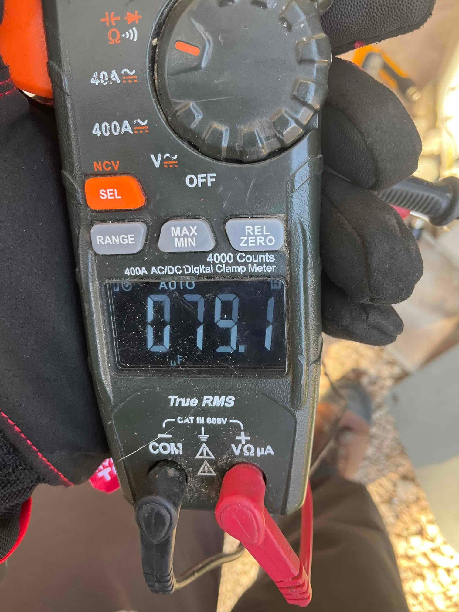 Diagnostic instrument display shows 79.1 μF.