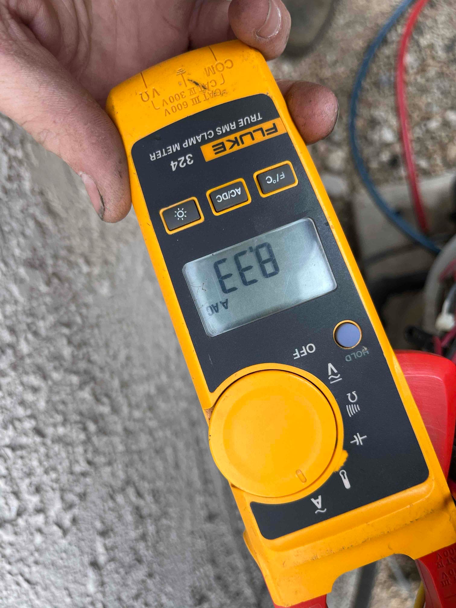 Diagnostic instrument display shows 8.33 A.