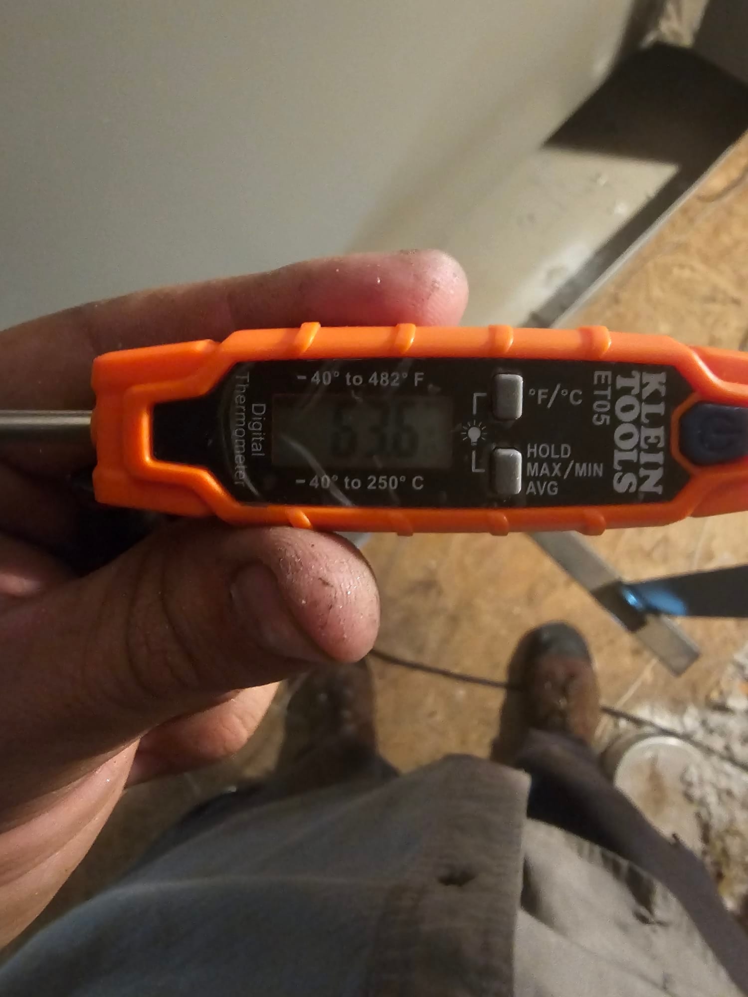 HVAC diagnostic instrument photographed during the service visit.