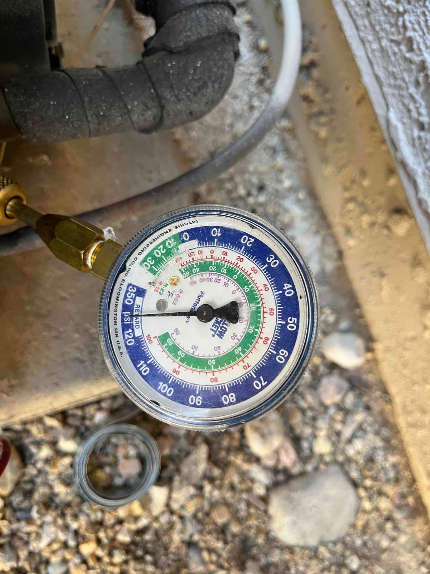 HVAC diagnostic instrument photographed during the service visit.