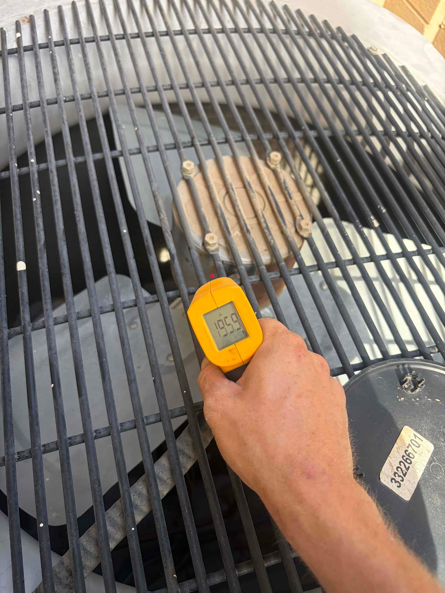 HVAC diagnostic instrument photographed during the service visit.