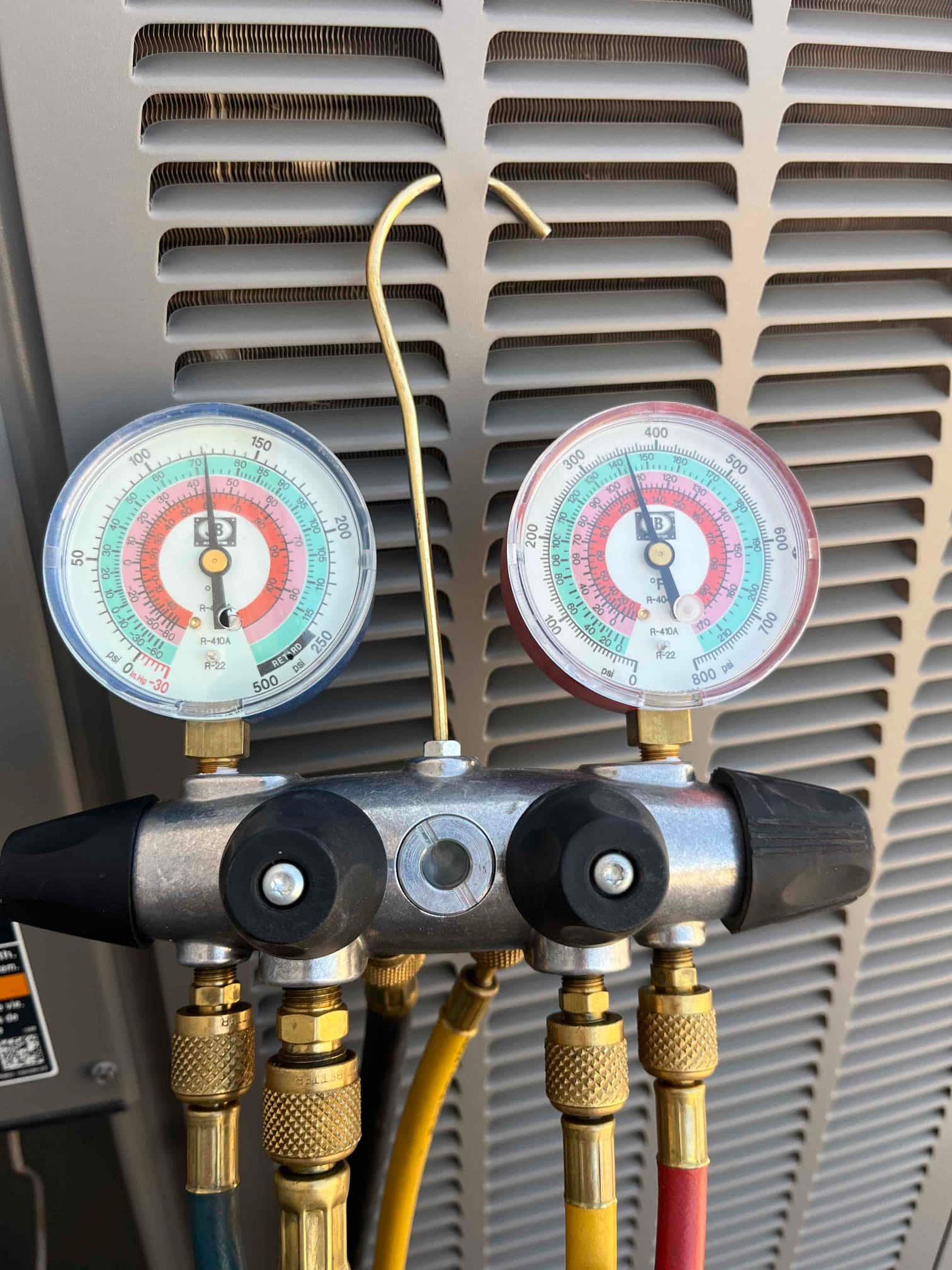 HVAC diagnostic instrument photographed during the service visit.