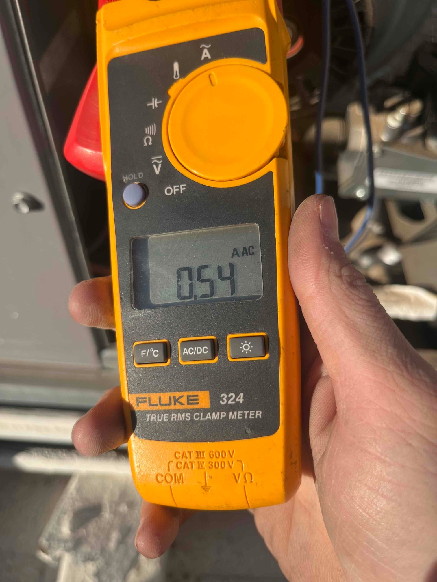 HVAC diagnostic instrument photographed during the service visit.