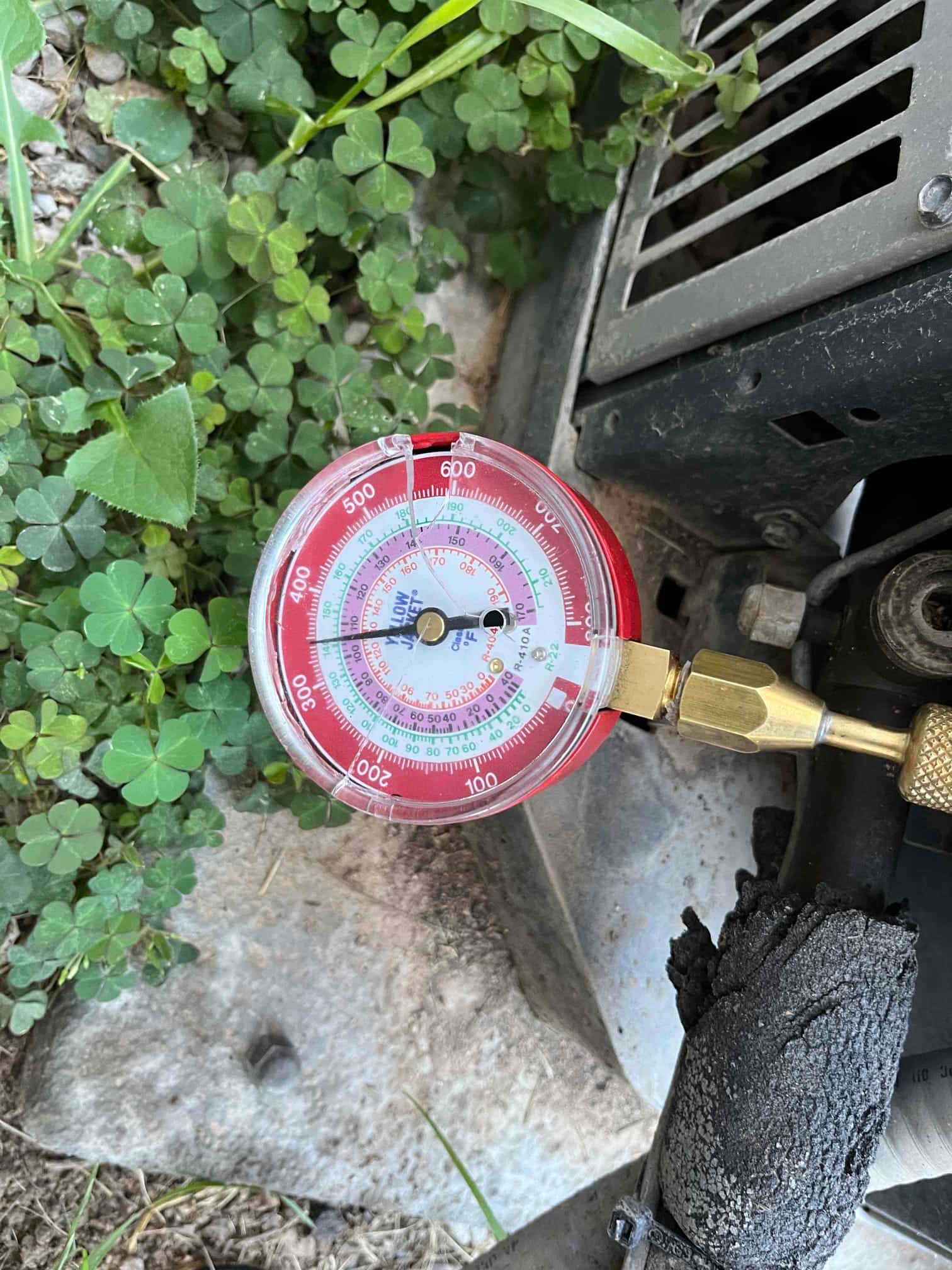 HVAC diagnostic instrument photographed during the service visit.