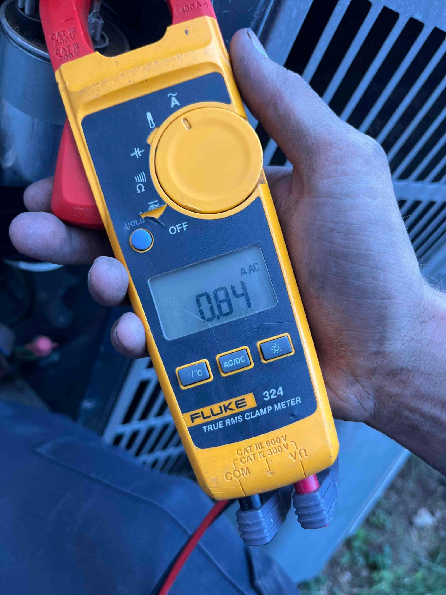 HVAC diagnostic instrument photographed during the service visit.
