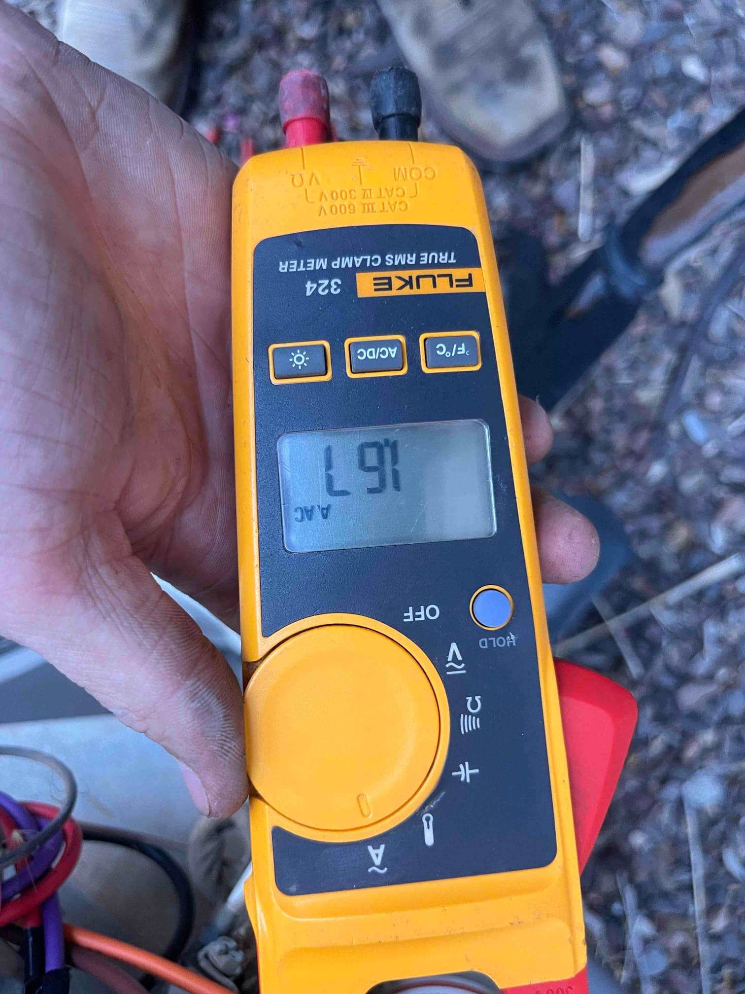 Diagnostic instrument display shows 16.1 A.