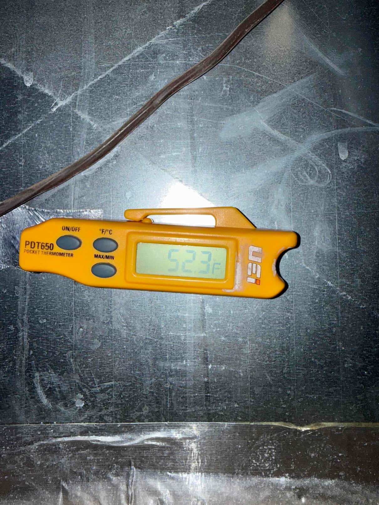 Diagnostic instrument display shows 52.3 °F.